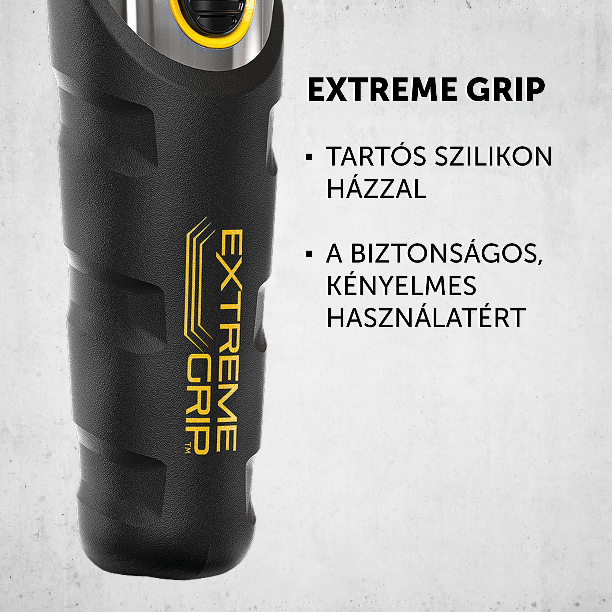 Egy fekete-sárga elektromos borotva fogantyú, „EXTREME GRIP” szöveggel és textúrált kialakítással a fogáshoz.