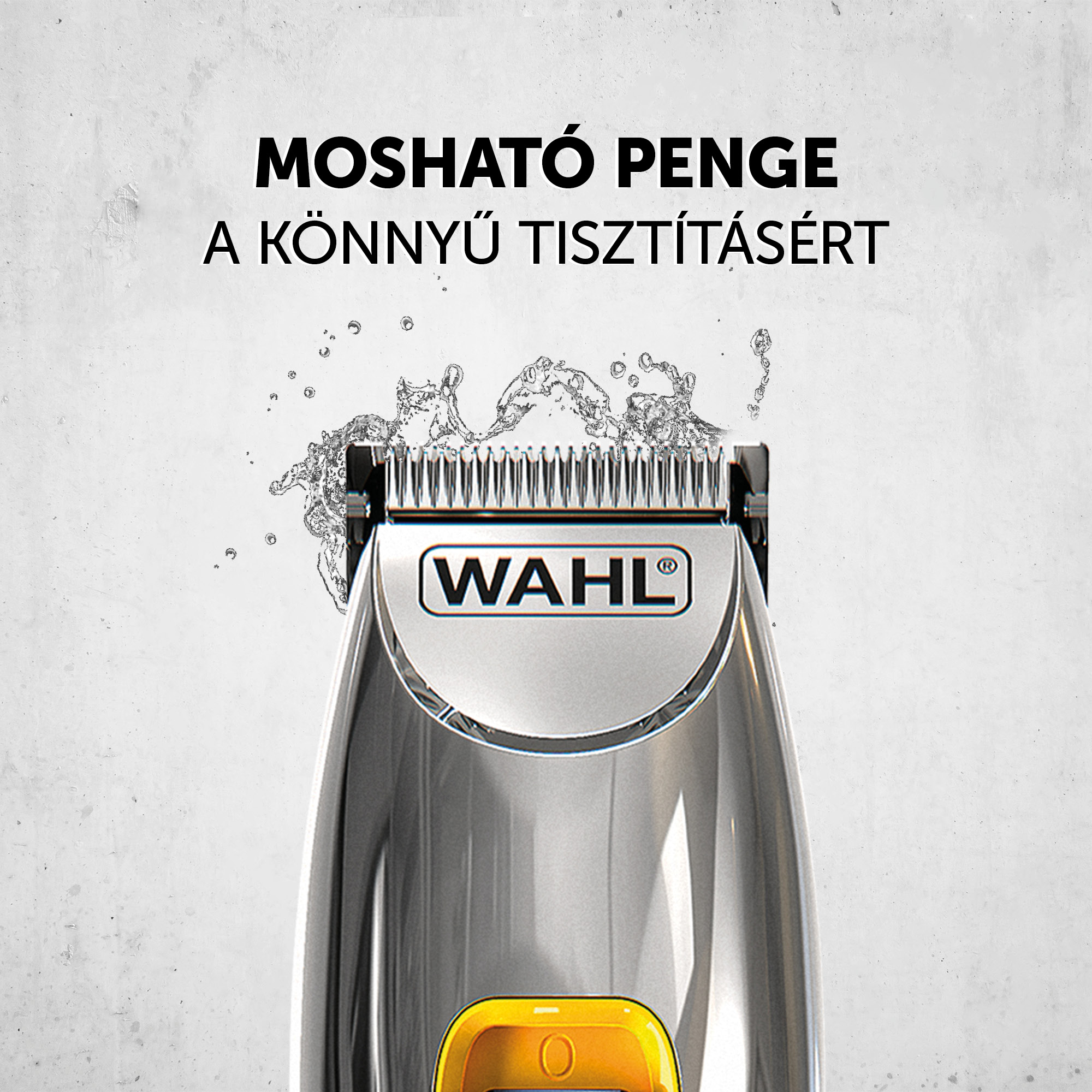 Borotvafej közelről, vízcseppekkel, a 'WAHL' márkanévvel.