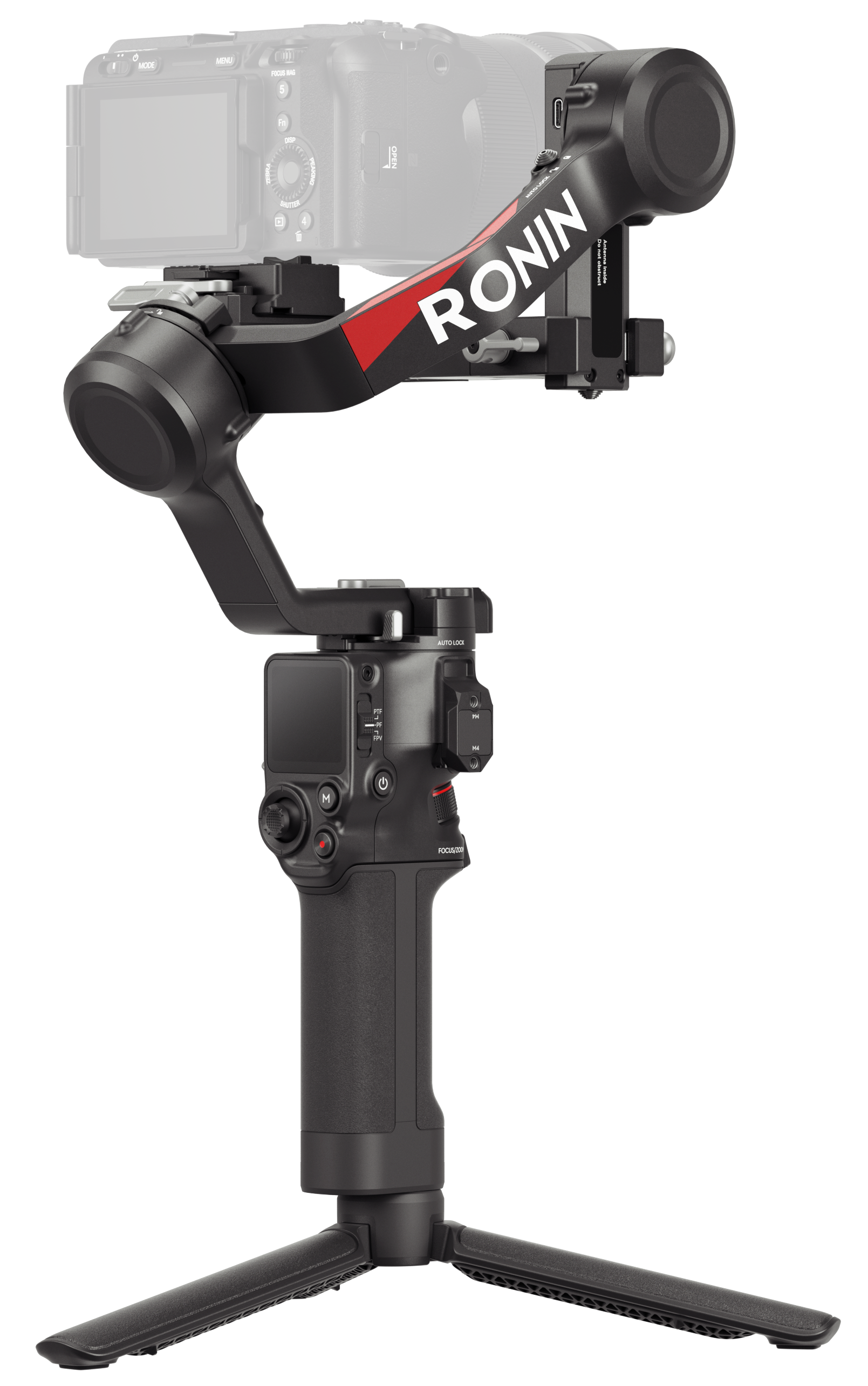 Kamera jest zamontowana na czarnym stabilizatorze kardanowym Ronin ze statywem.