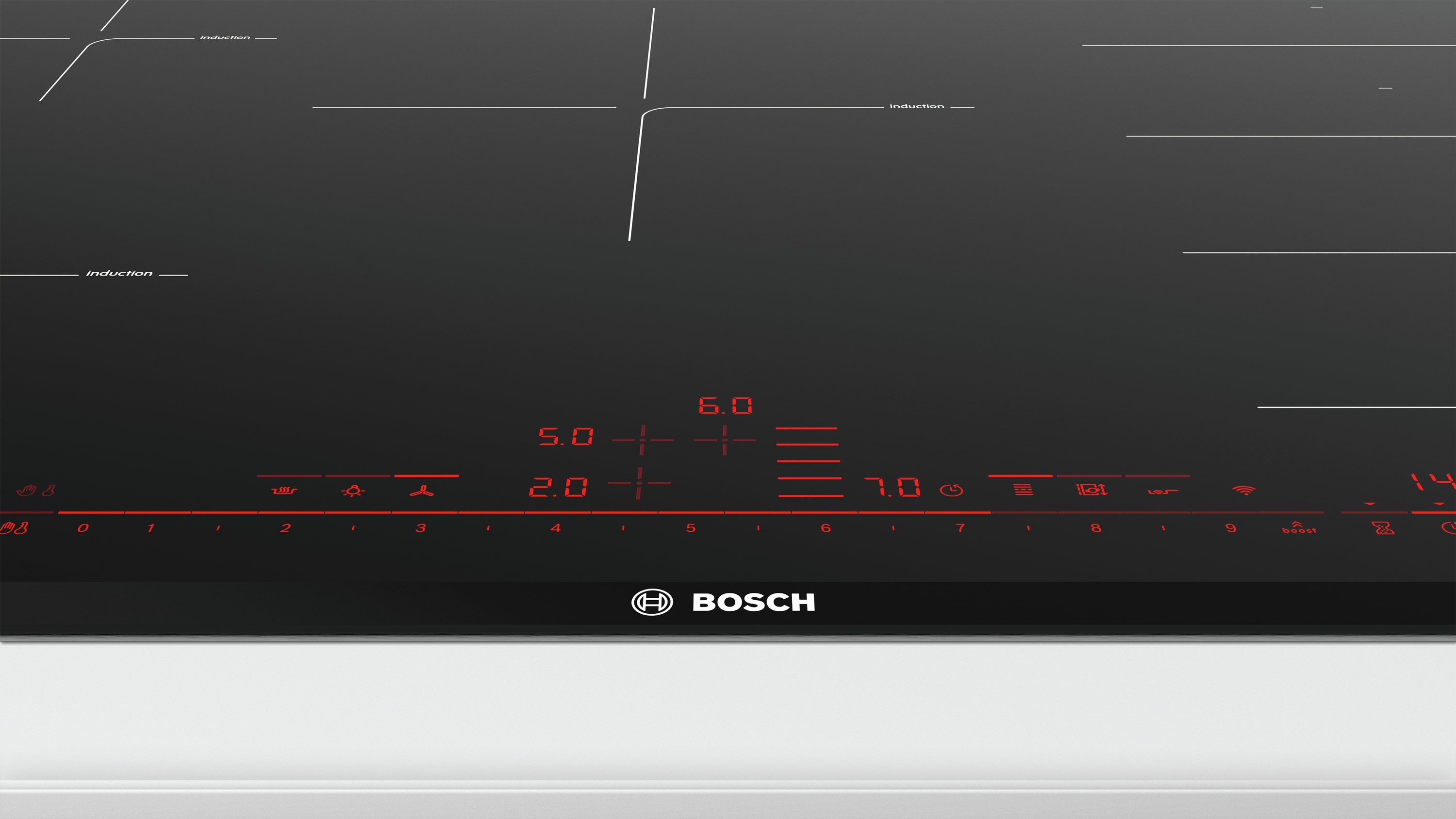 Une table de cuisson à induction noire avec affichages numériques rouges et le logo Bosch.