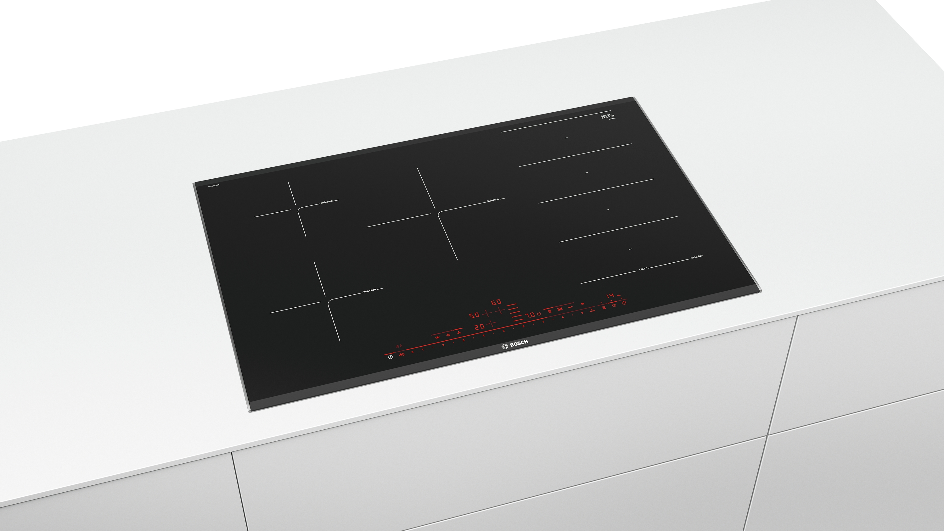 Une table de cuisson noire avec cinq brûleurs, sur un plan de travail blanc. Le logo Bosch est visible.