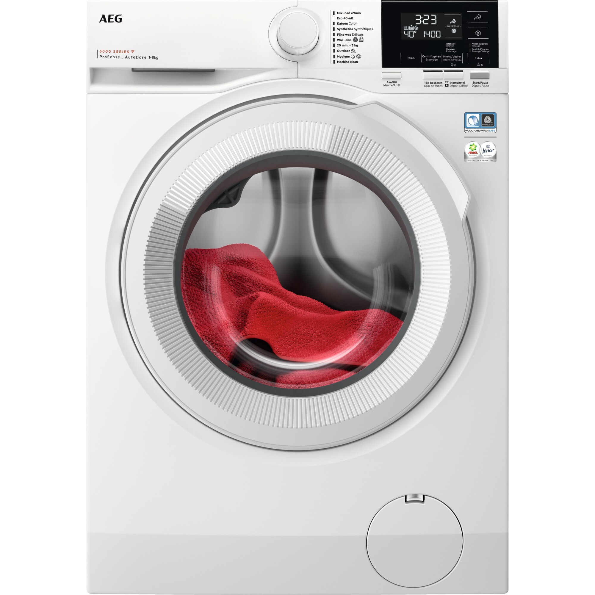 A white washing machine with a red item inside the drum. AEG logo.