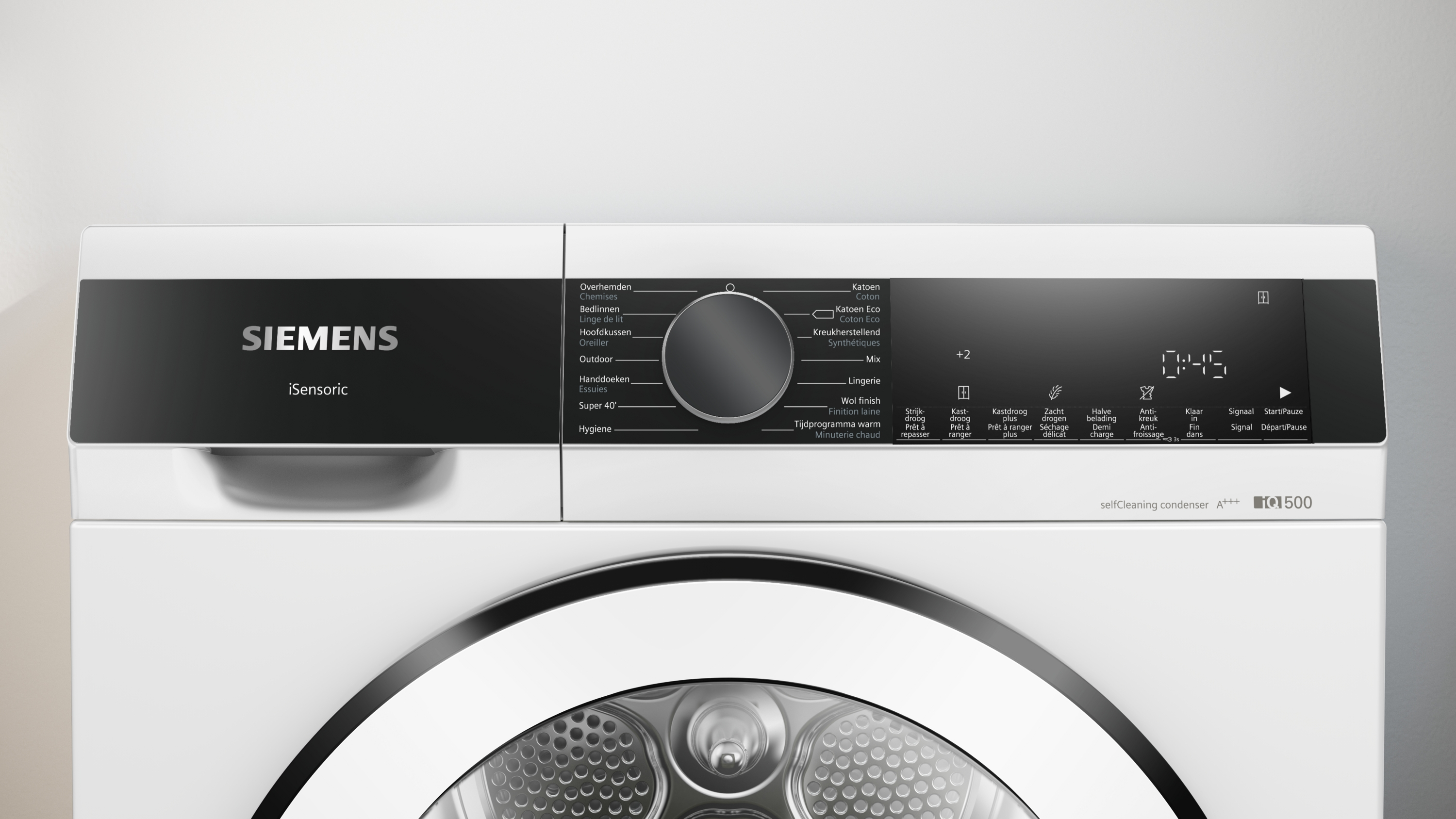 Top view of a white clothes dryer control panel, showing settings and a digital display.