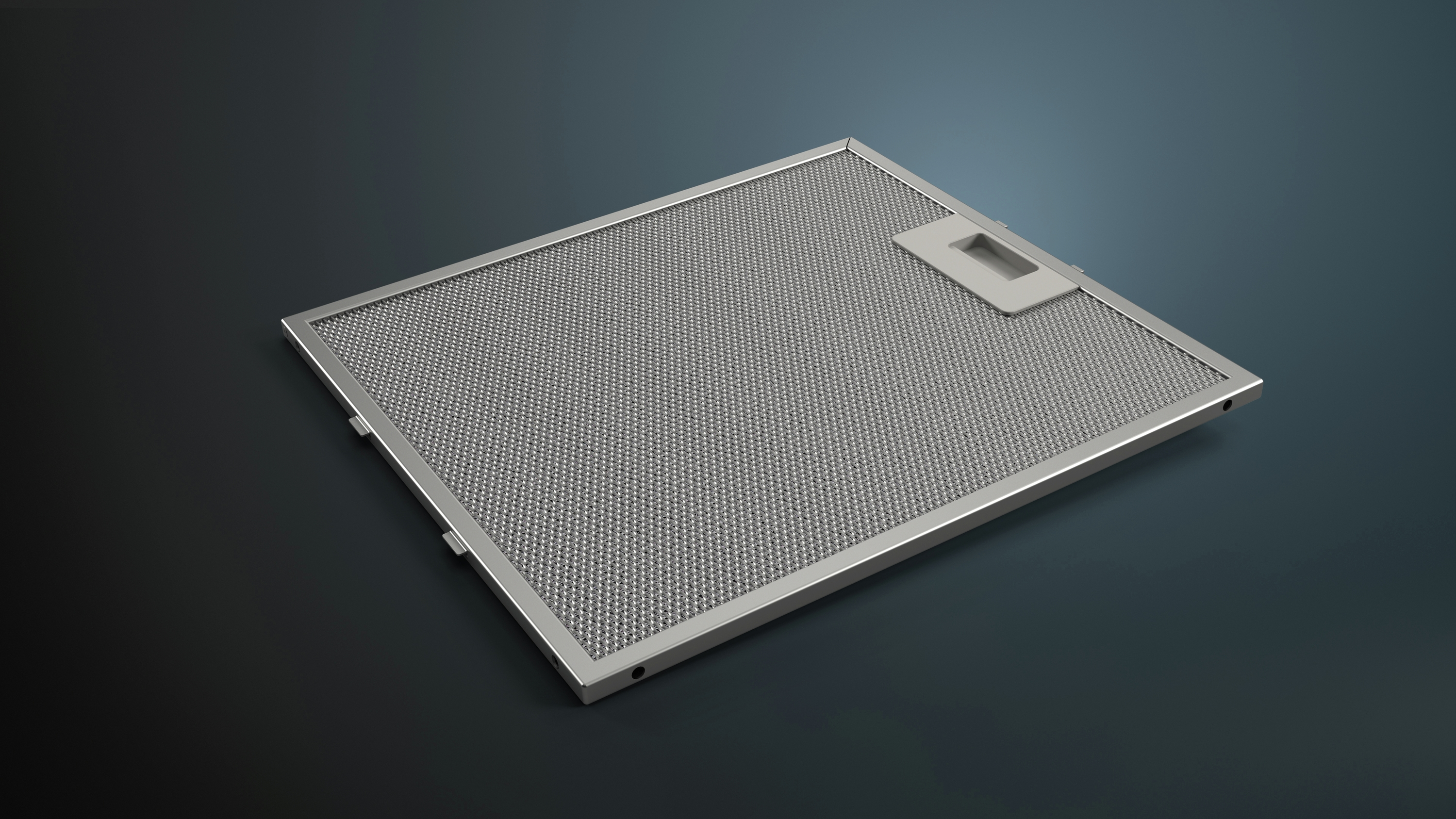 Silberner rechteckiger Dunstabzugsfilter mit Mesh-Design und einem Griff.