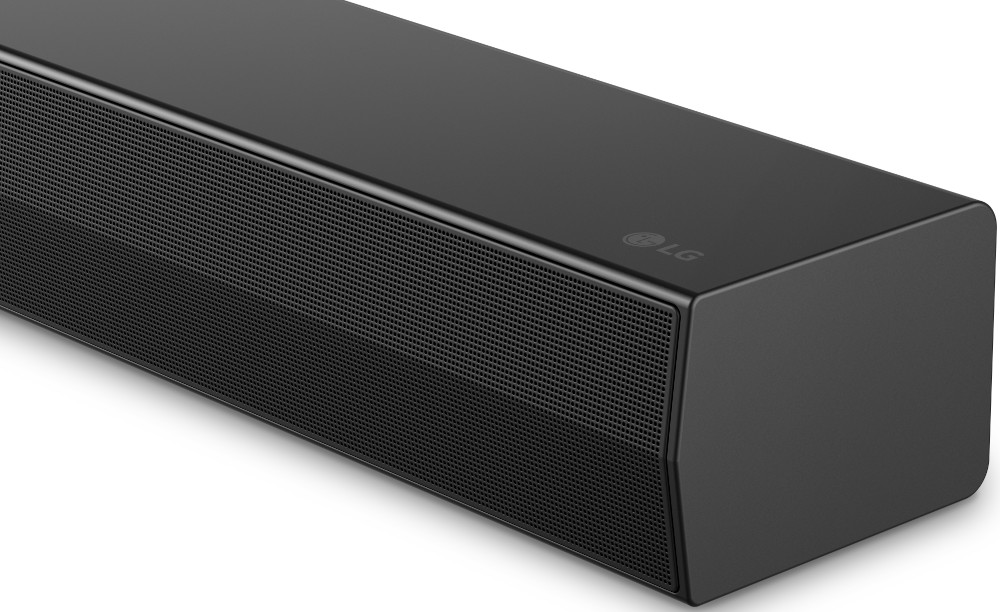 A black soundbar with mesh speaker grilles and the LG logo.