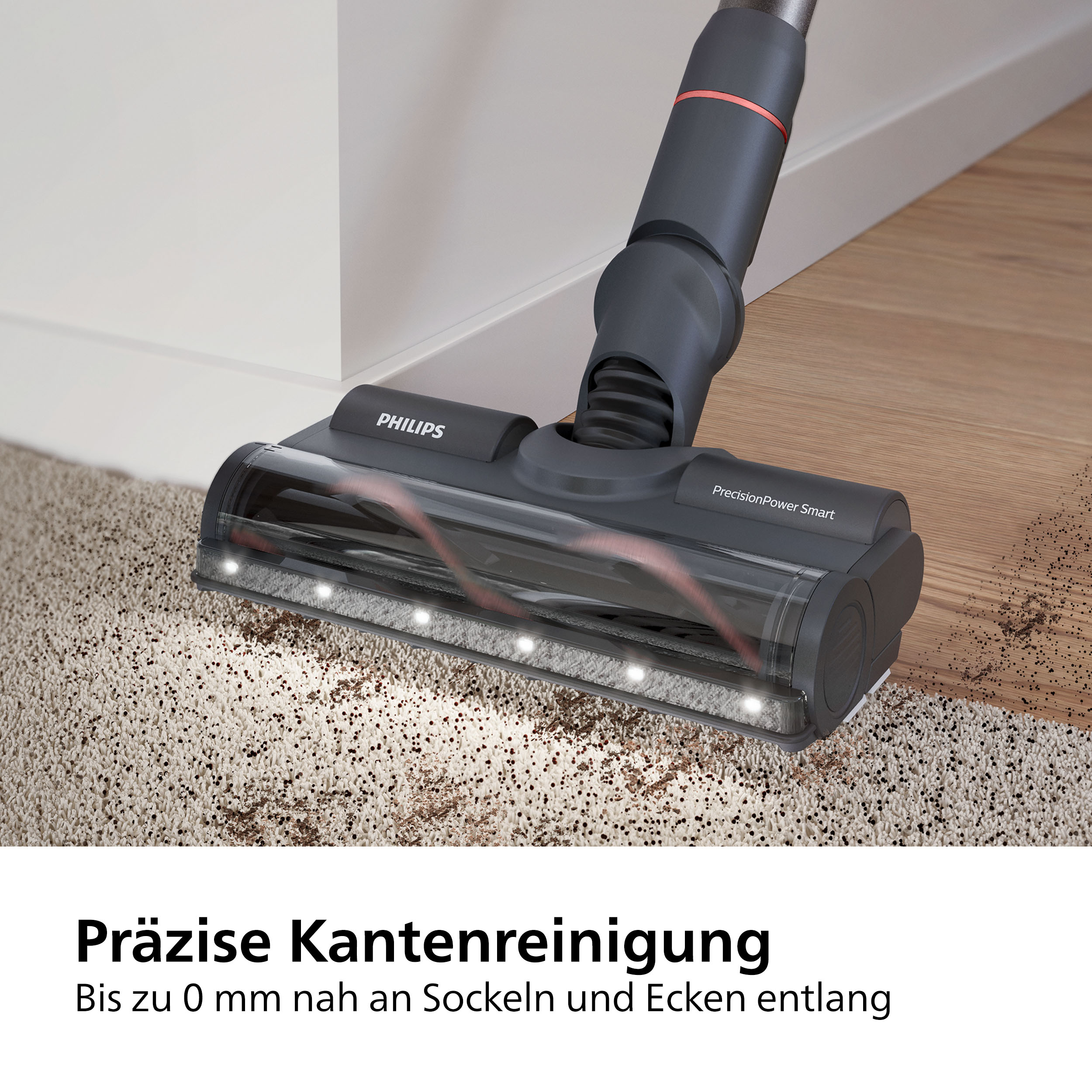 Staubsaugerkopf auf Teppich, zeigt Beleuchtung und Reinigungsaktion, Text auf Deutsch.