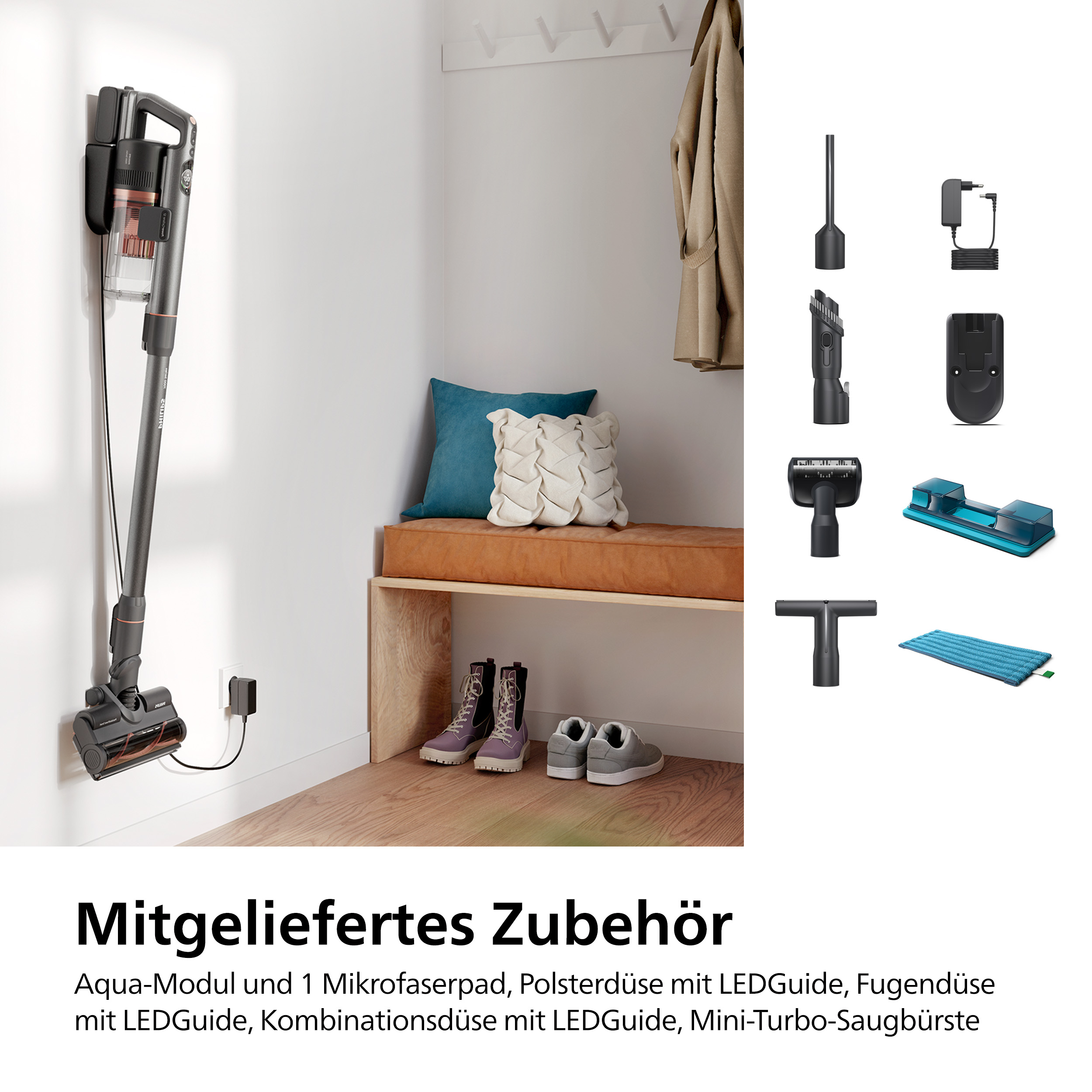 Kabelloser Staubsauger an der Wand mit Zubehör, einer Bank und einer Garderobe.