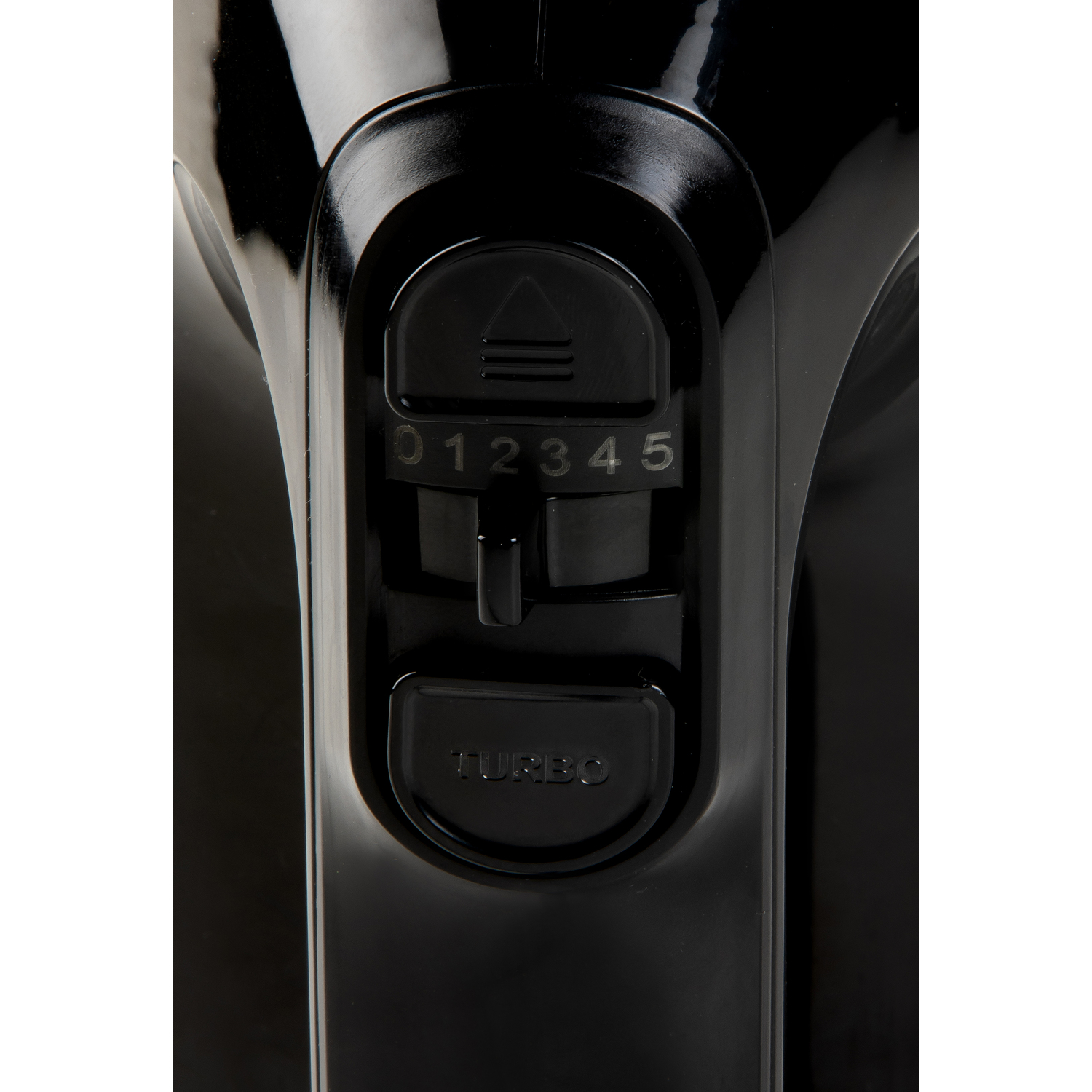 Close-up of a black mixer with speed and turbo control buttons.