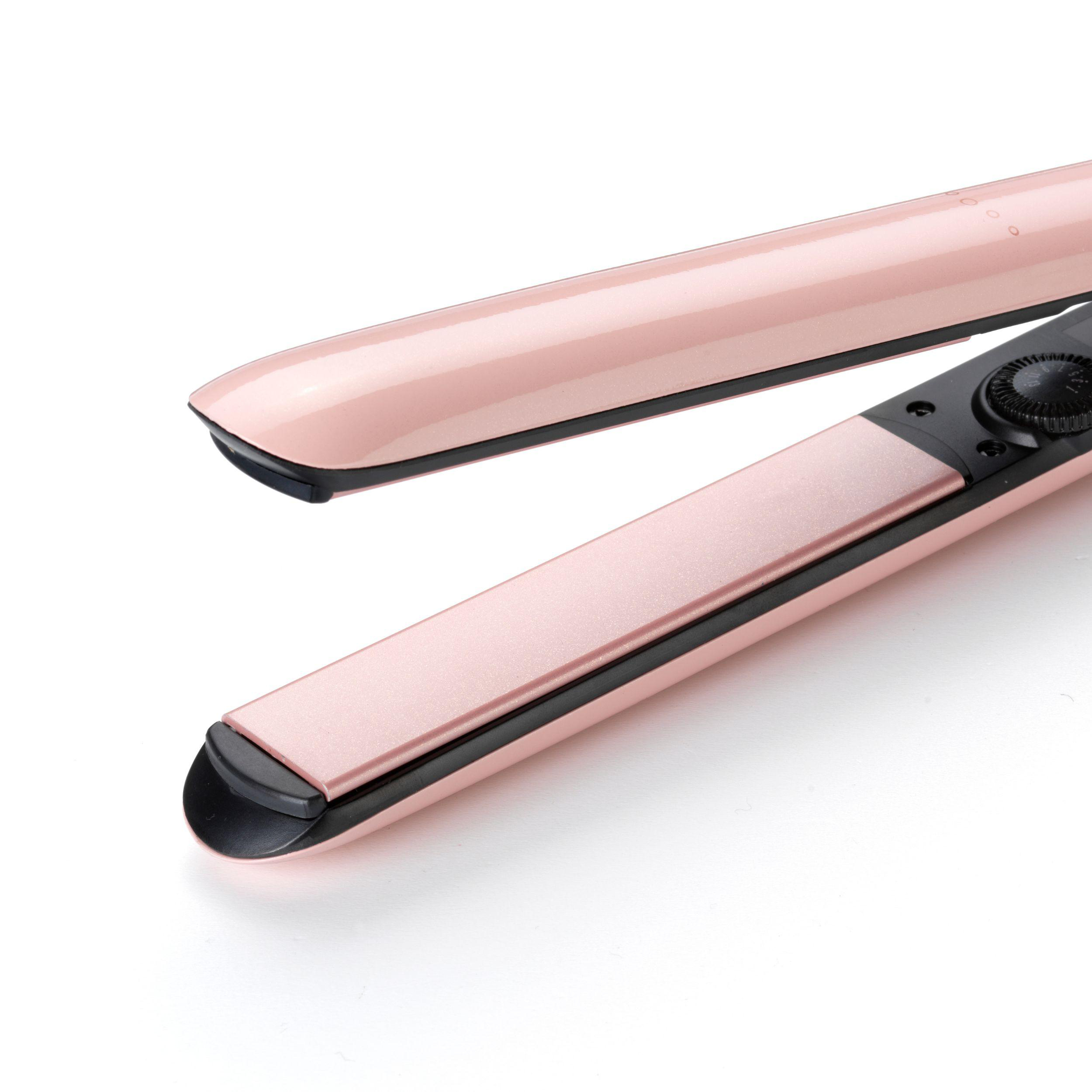Nahaufnahme eines roségoldenen Haarglätters auf weißem Hintergrund, die Platten und Bedienelemente zeigend.