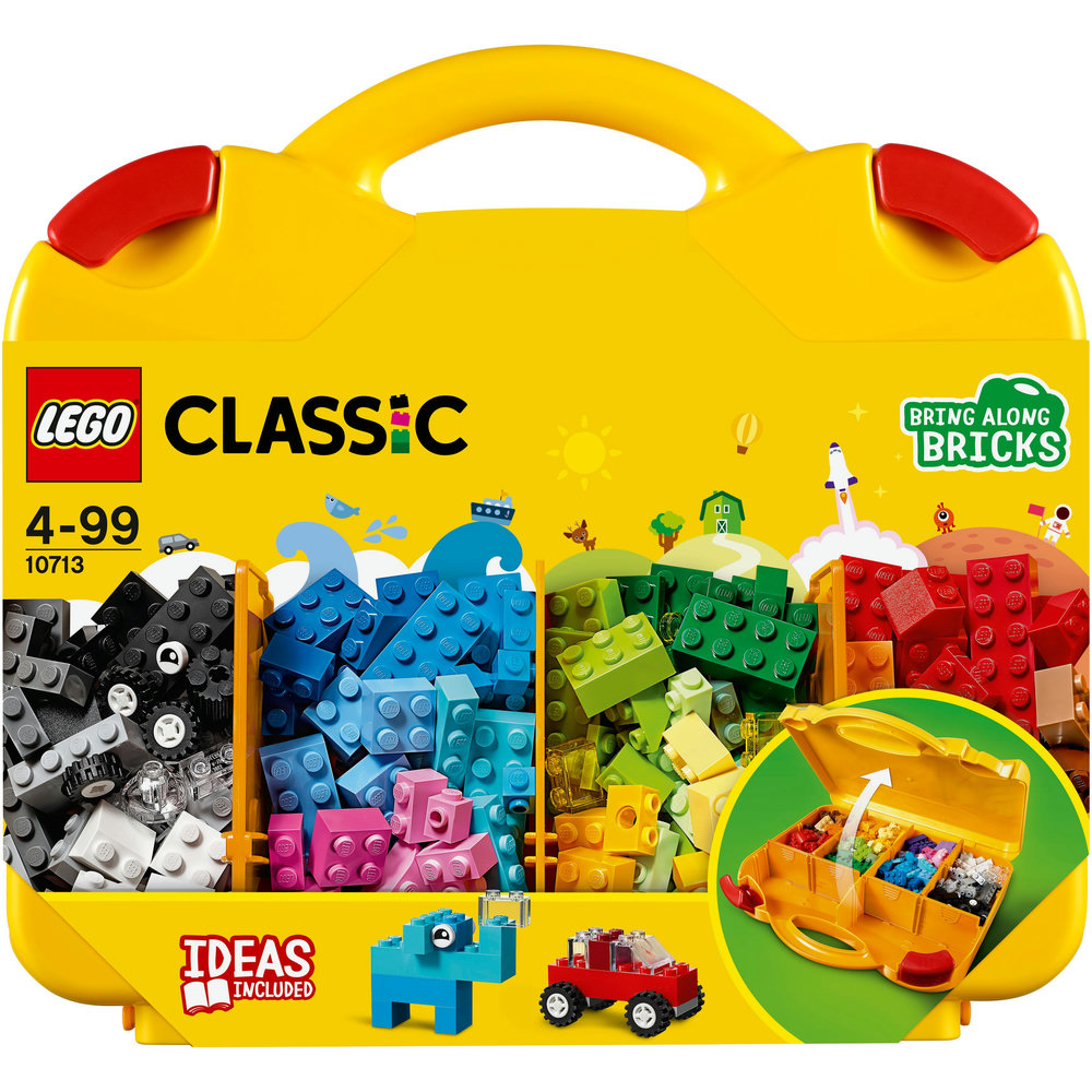 Gelbe LEGO Classic Aufbewahrungsbox mit verschiedenen farbigen Steinen und gebauten Modellen.