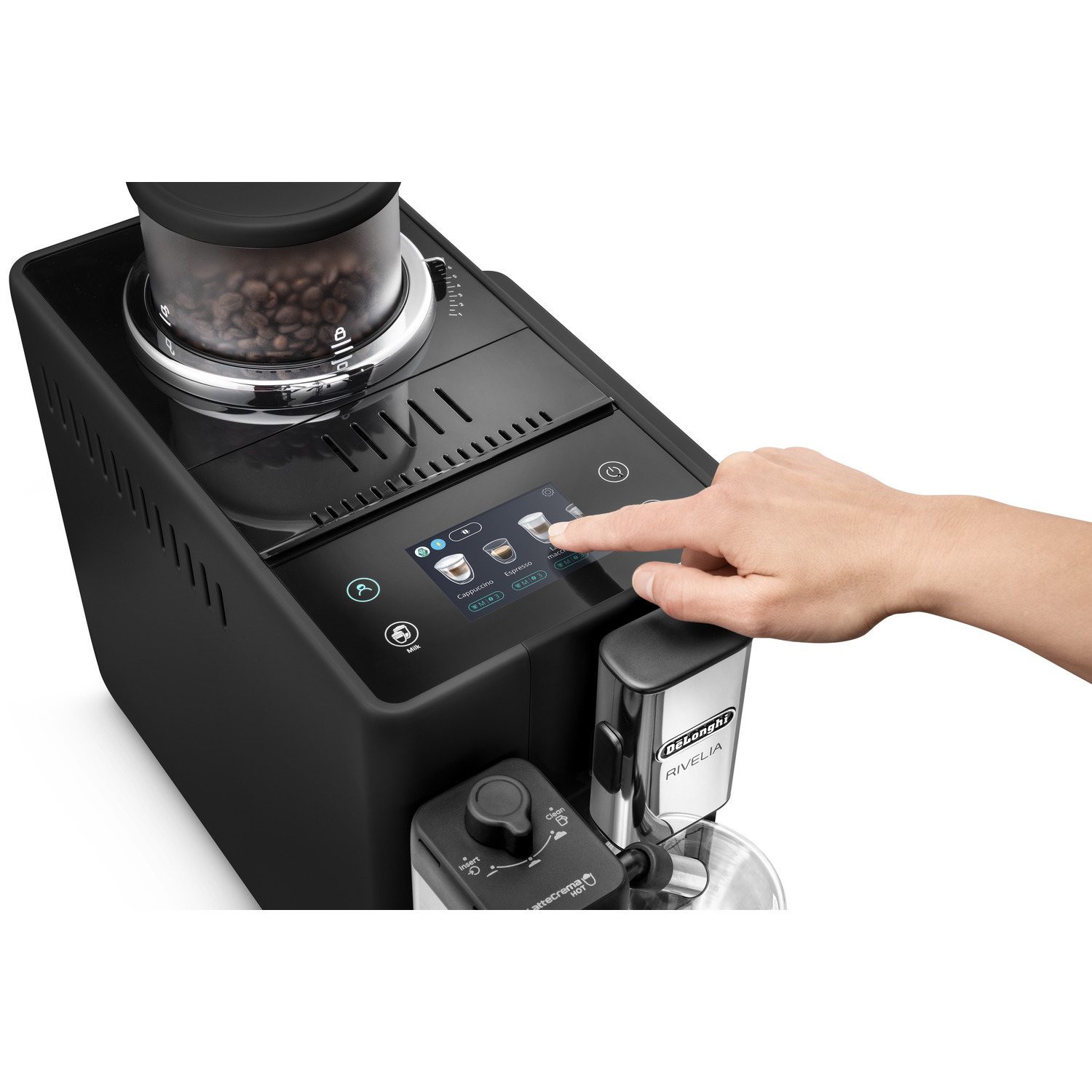 A person's hand touching a touchscreen on a black coffee machine with coffee beans visible.