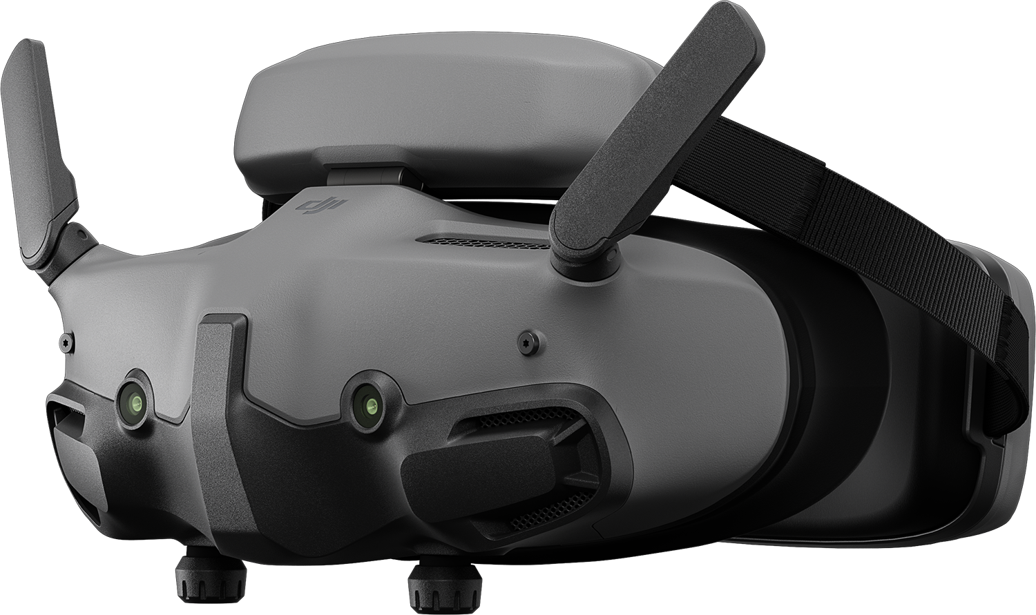 Szürke VR headset, oldalsó nézet. Két lencse, antennák felül. Fekete pánt. Sötét háttér.
