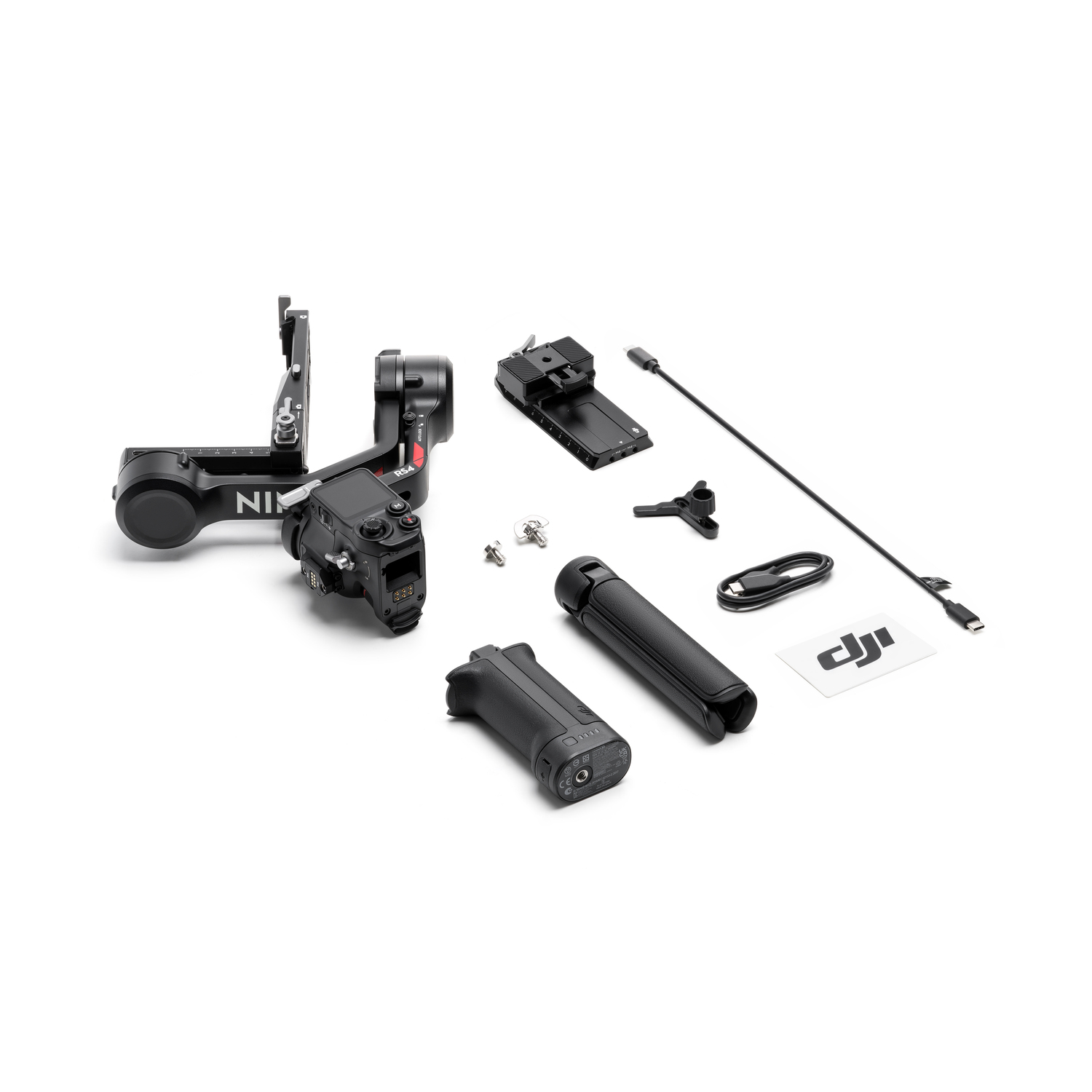 A camera setup with a gimbal, a camera, and various accessories. The items are on a white surface.