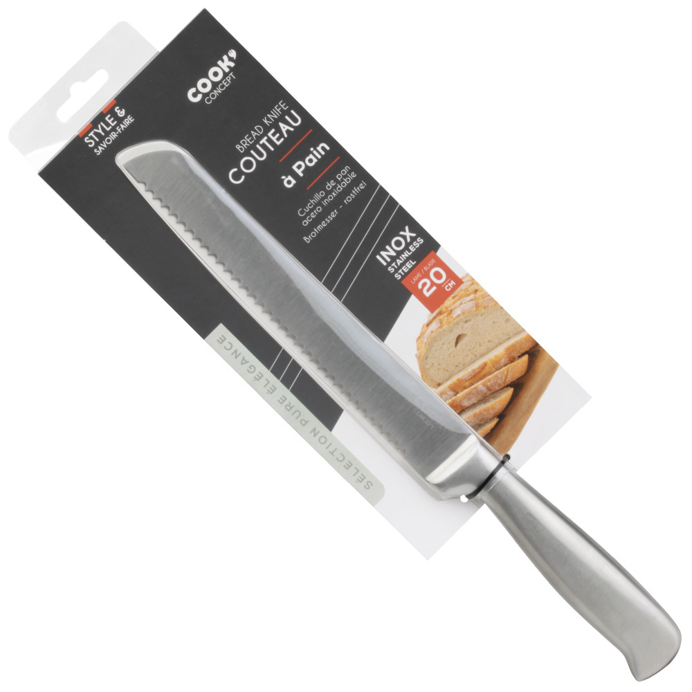 Un cuchillo de pan en su embalaje. Es de acero inoxidable.