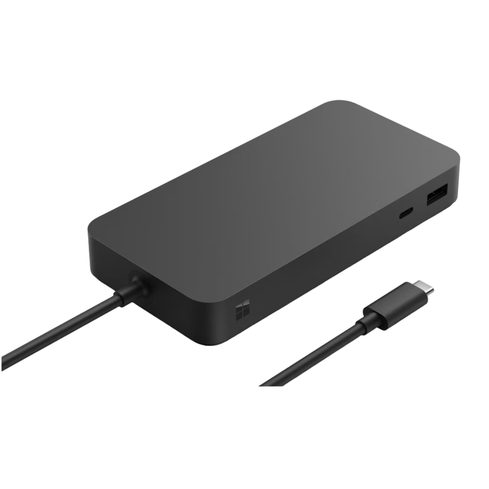 Eine schwarze Dockingstation mit Kabel und Anschluss. Sie steht auf einer schwarzen Oberfläche.