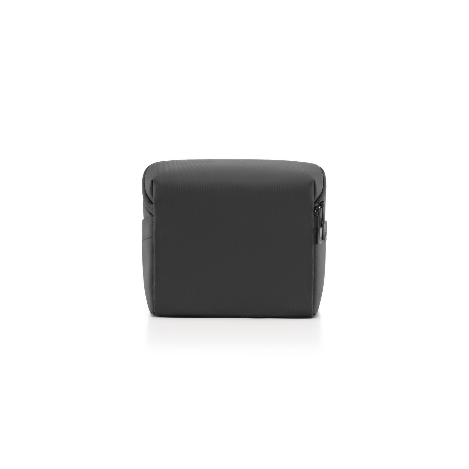 A small, black, rectangular bag. It is plain and has a zipper on one side.