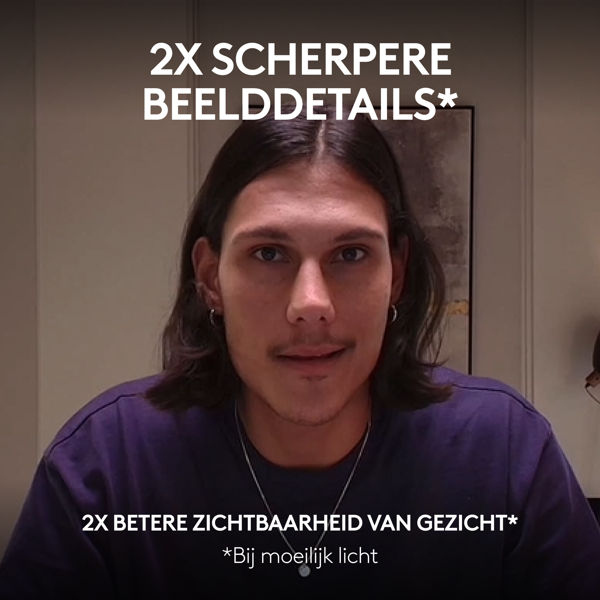 Man in purple shirt smiling, with text about image details.