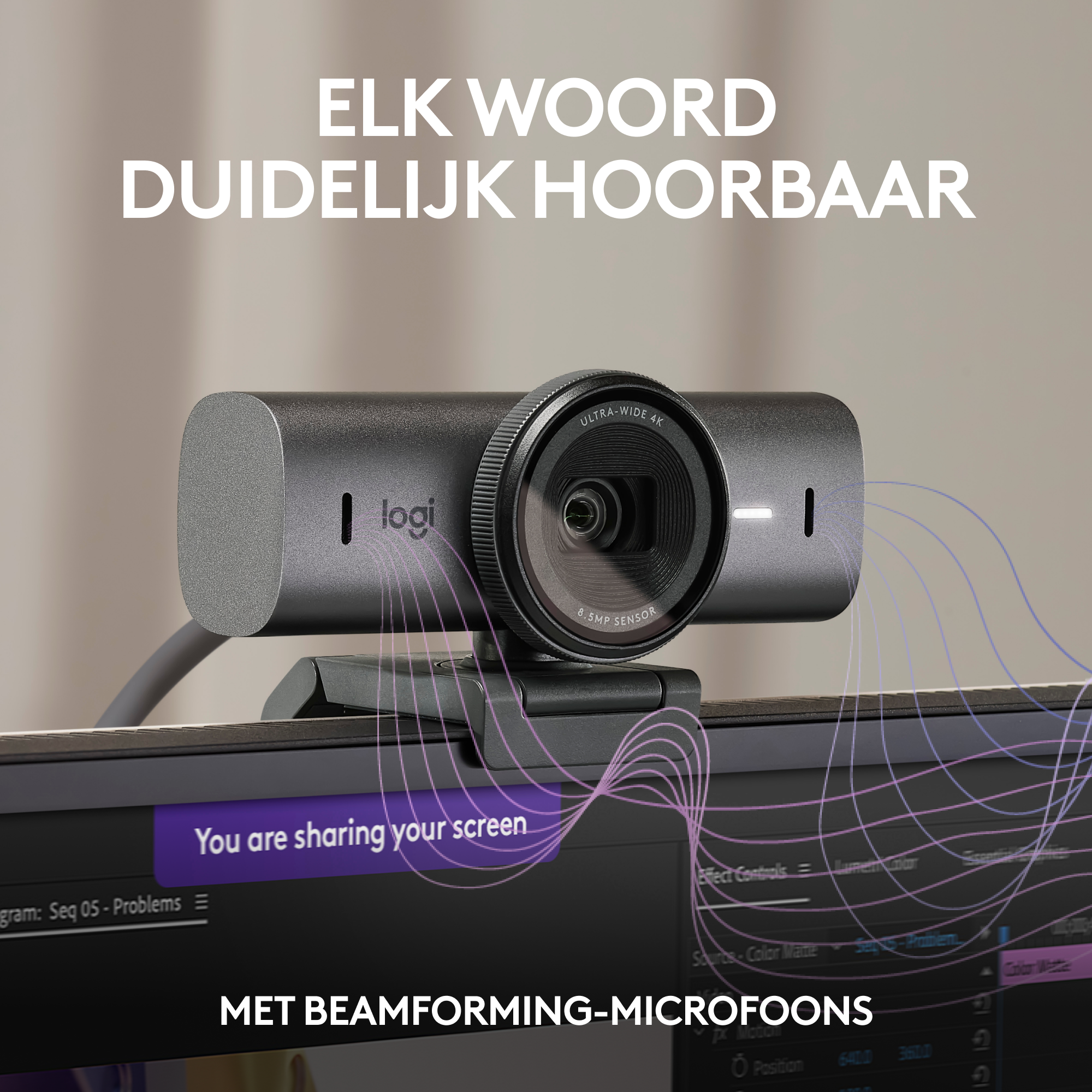 Webcam on monitor, purple lines, and text.
