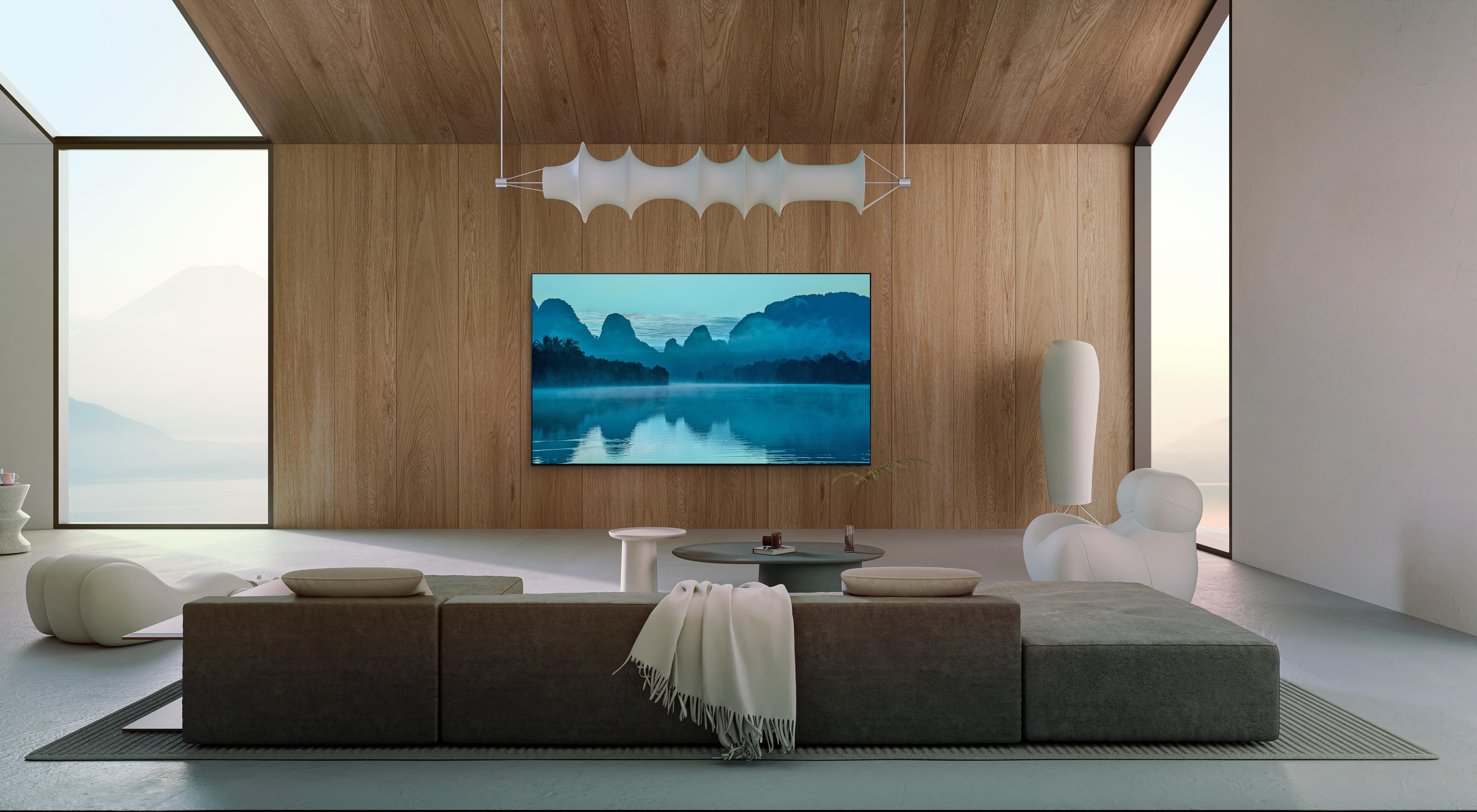 Wohnzimmer mit Fernseher, der eine Landschaft zeigt.
