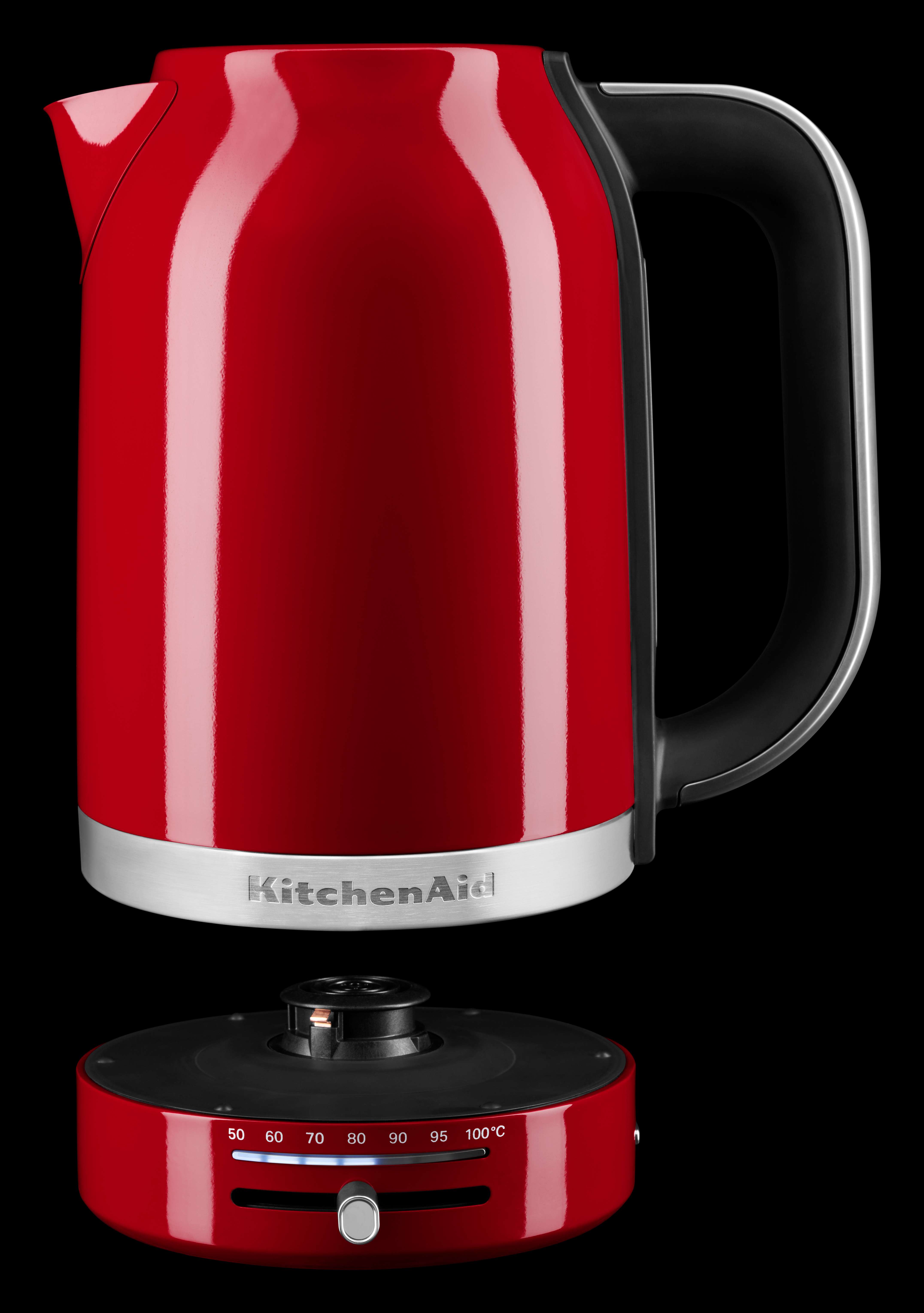 Ein roter Wasserkocher mit schwarzem Griff und Sockel mit Temperaturregler und Anzeige, auf schwarzem Hintergrund.