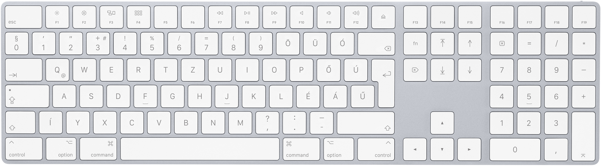 Fehér Apple Magic Keyboard billentyűkkel, szürke felületen.