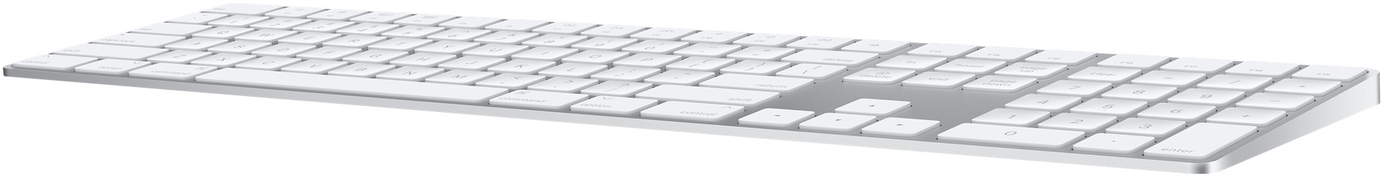 Egy fehér Apple billentyűzet numerikus paddal, enyhe szögből nézve.