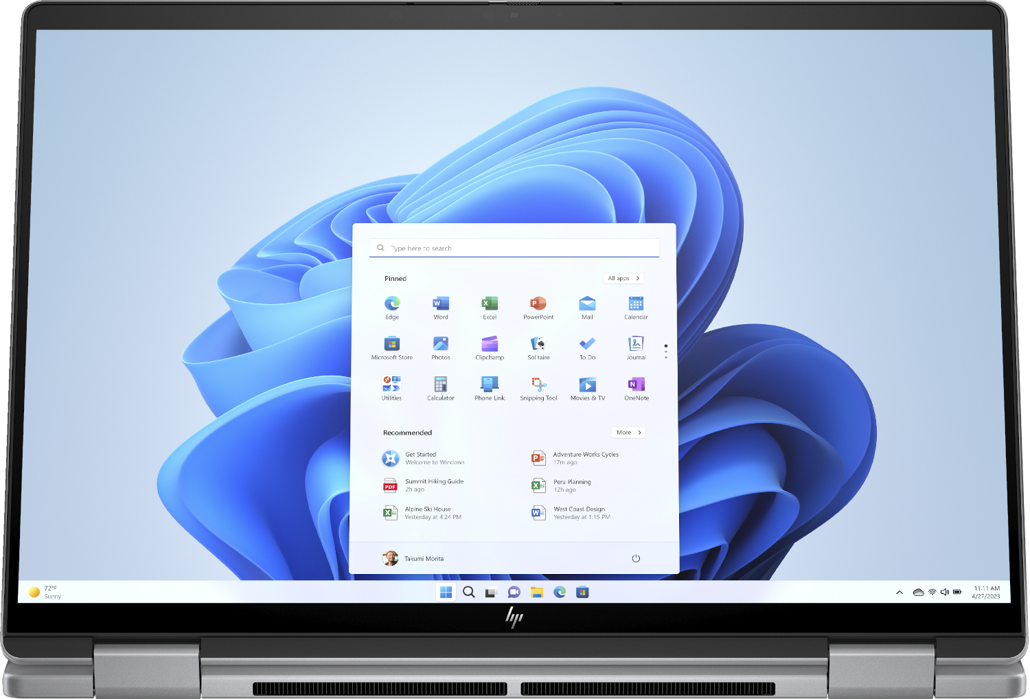 Ordinateur portable HP avec l'interface Windows 11 affichant un menu Démarrer.