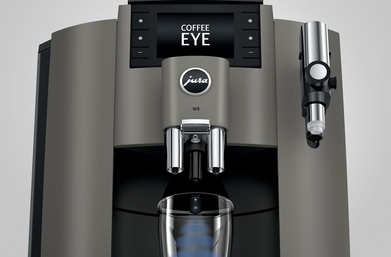 Eine Kaffeemaschine mit Bildschirm und dem Wort 'Kaffee' angezeigt.