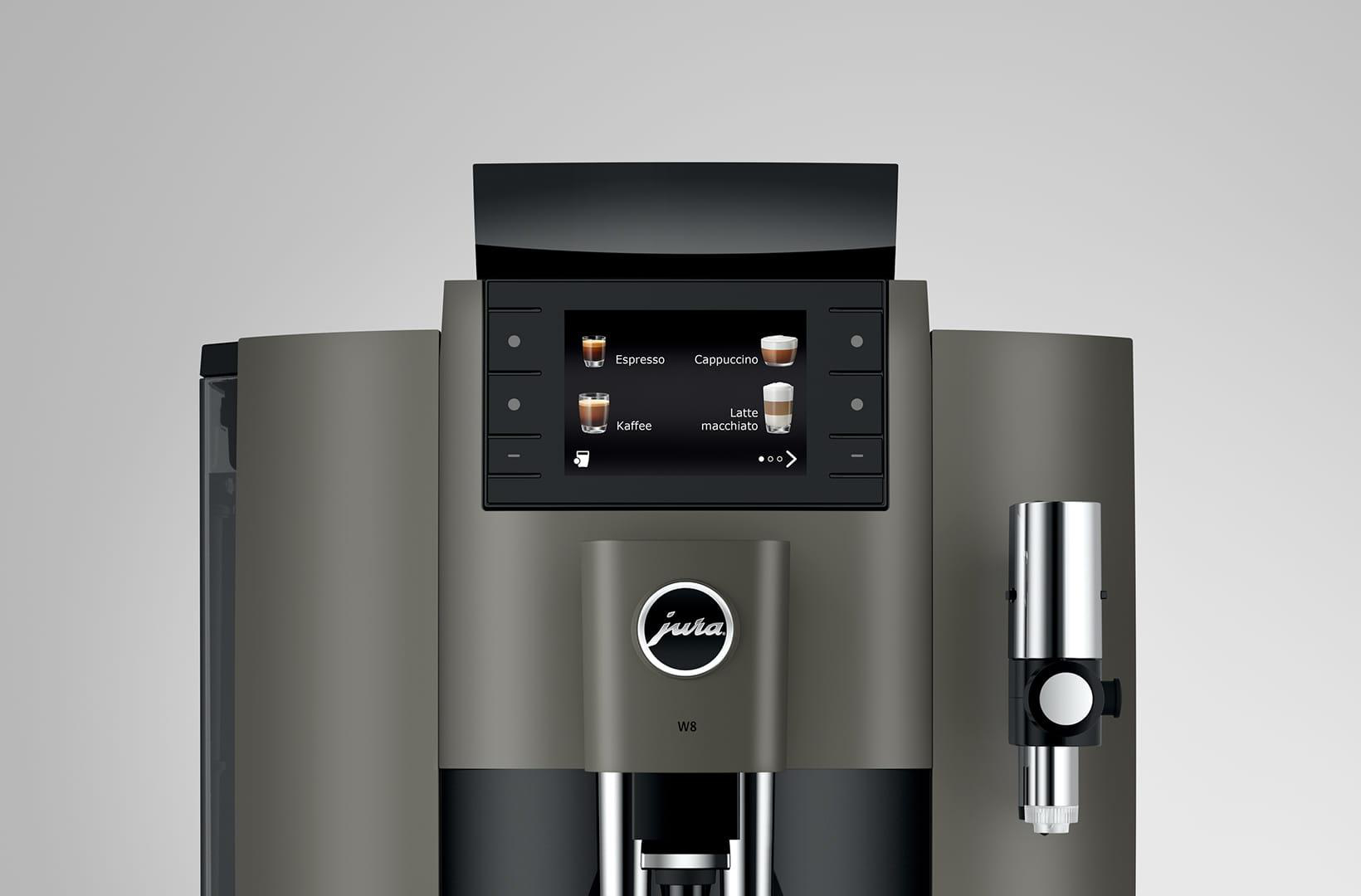 Eine Kaffeemaschine mit einem Bildschirm, der Kaffeeoptionen anzeigt, mit einem Kaffeeauslauf rechts.
