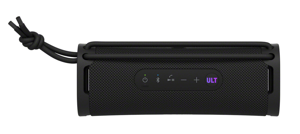 Czarny głośnik przenośny z przyciskami i pętlą do przenoszenia.