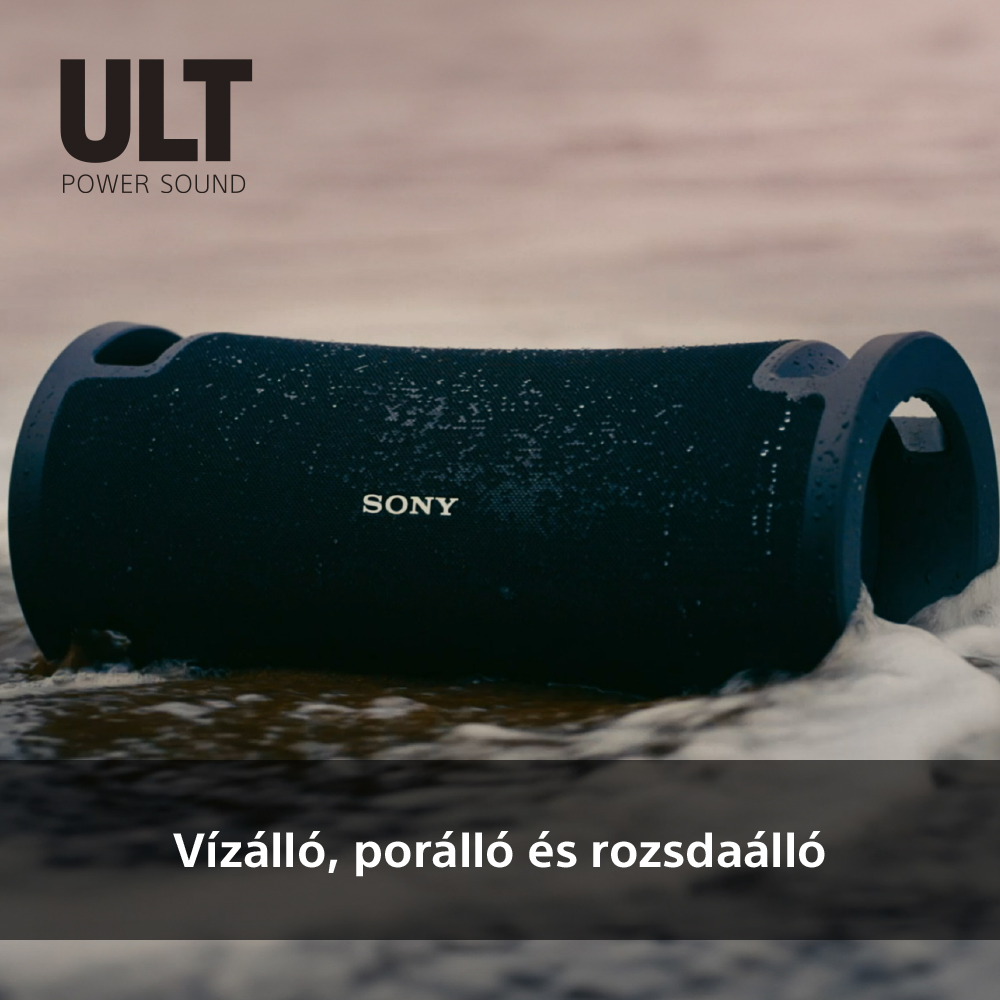 Fekete, hengeres hangszóró a strandon. Szöveg: Vízálló, porálló és rozsdamentes.