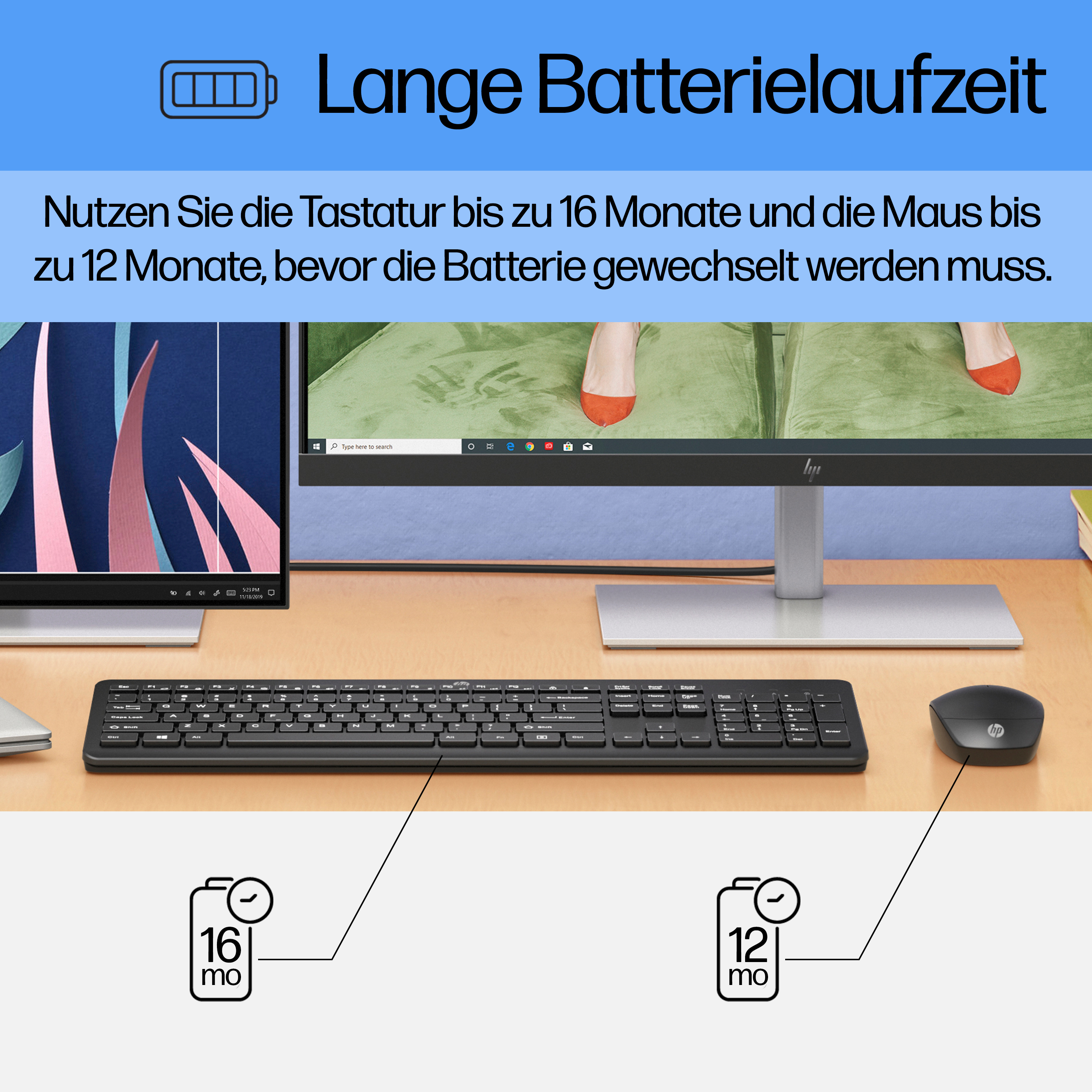 Ein Schreibtisch mit Tastatur, Maus und Monitor mit Text über die Akkulaufzeit.