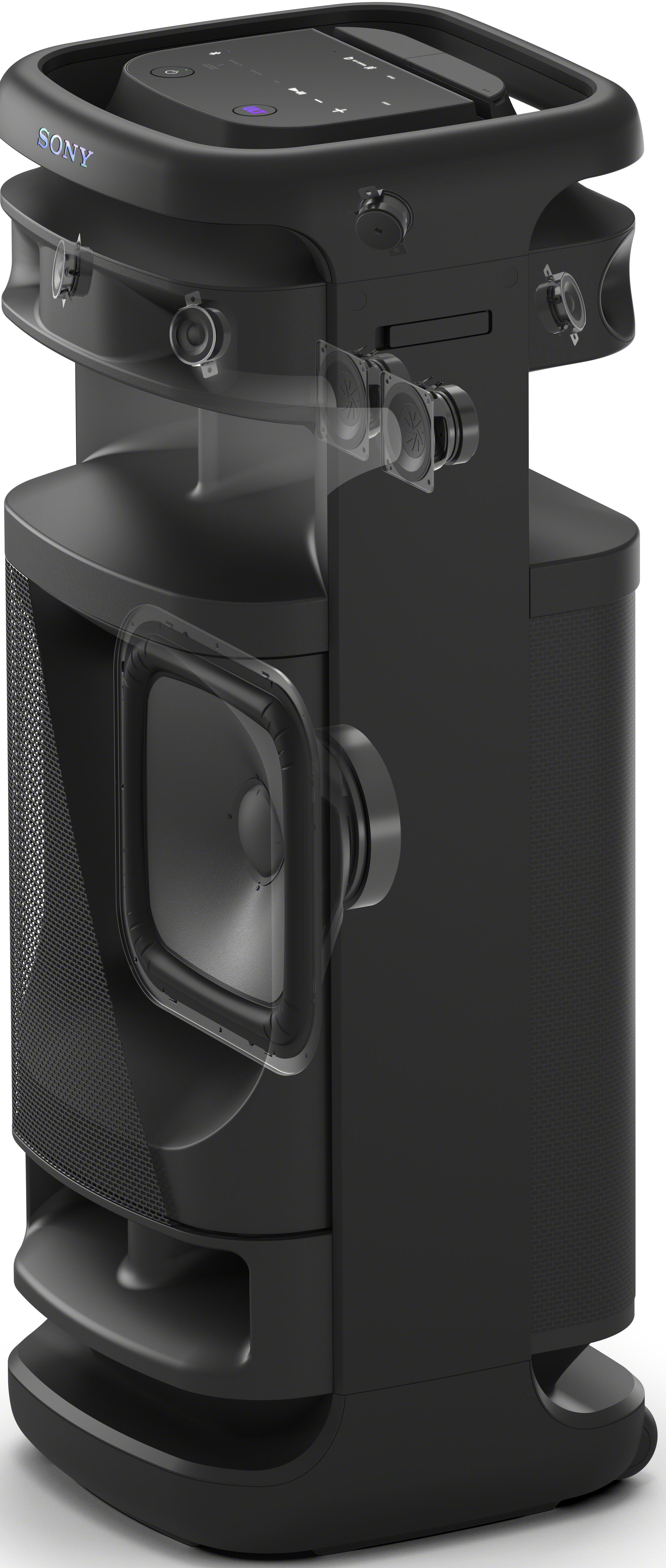 Vue en coupe d'une enceinte noire. Montre les composants internes, avec un grand woofer visible.
