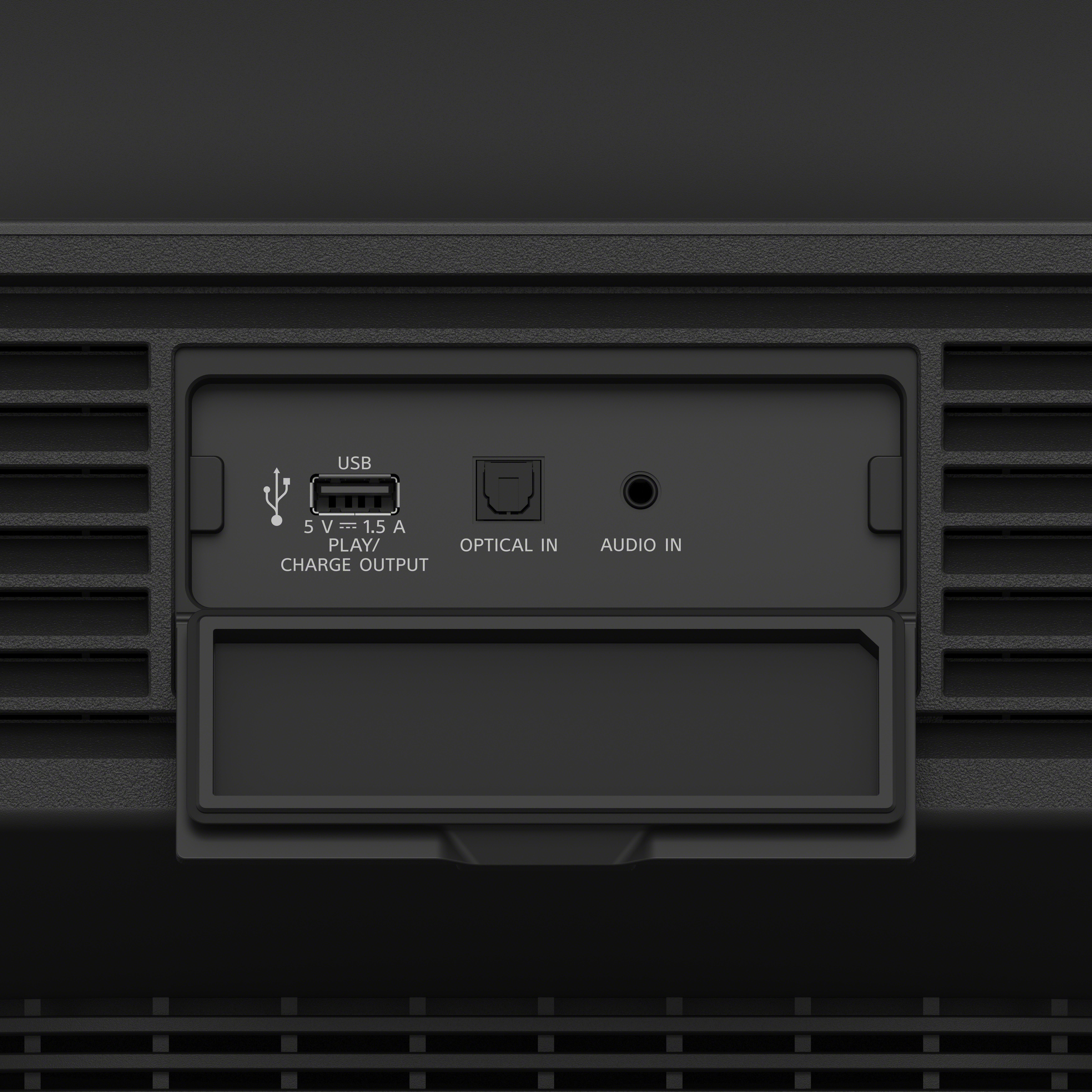 Appareil noir avec ports USB, optique et entrée audio.