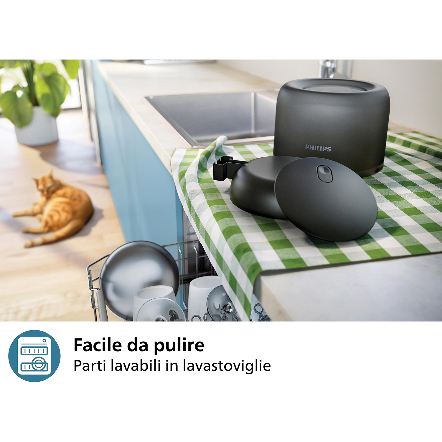 Un dispositivo Philips nero e accessori. È su un bancone vicino a un lavandino. C'è un gatto sullo sfondo.