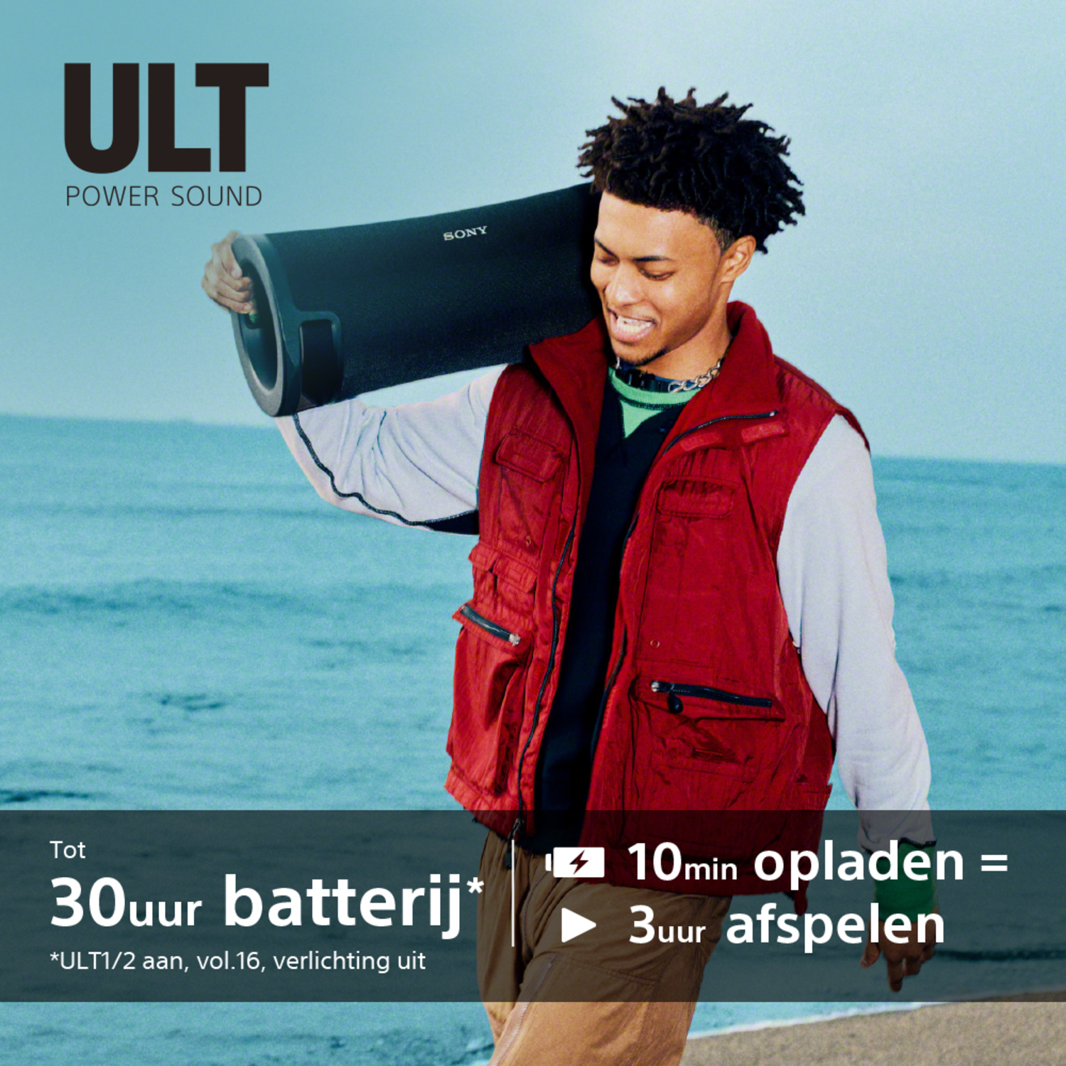 Man carries a speaker on his shoulder, text on the left says 'ULT Power Sound'.