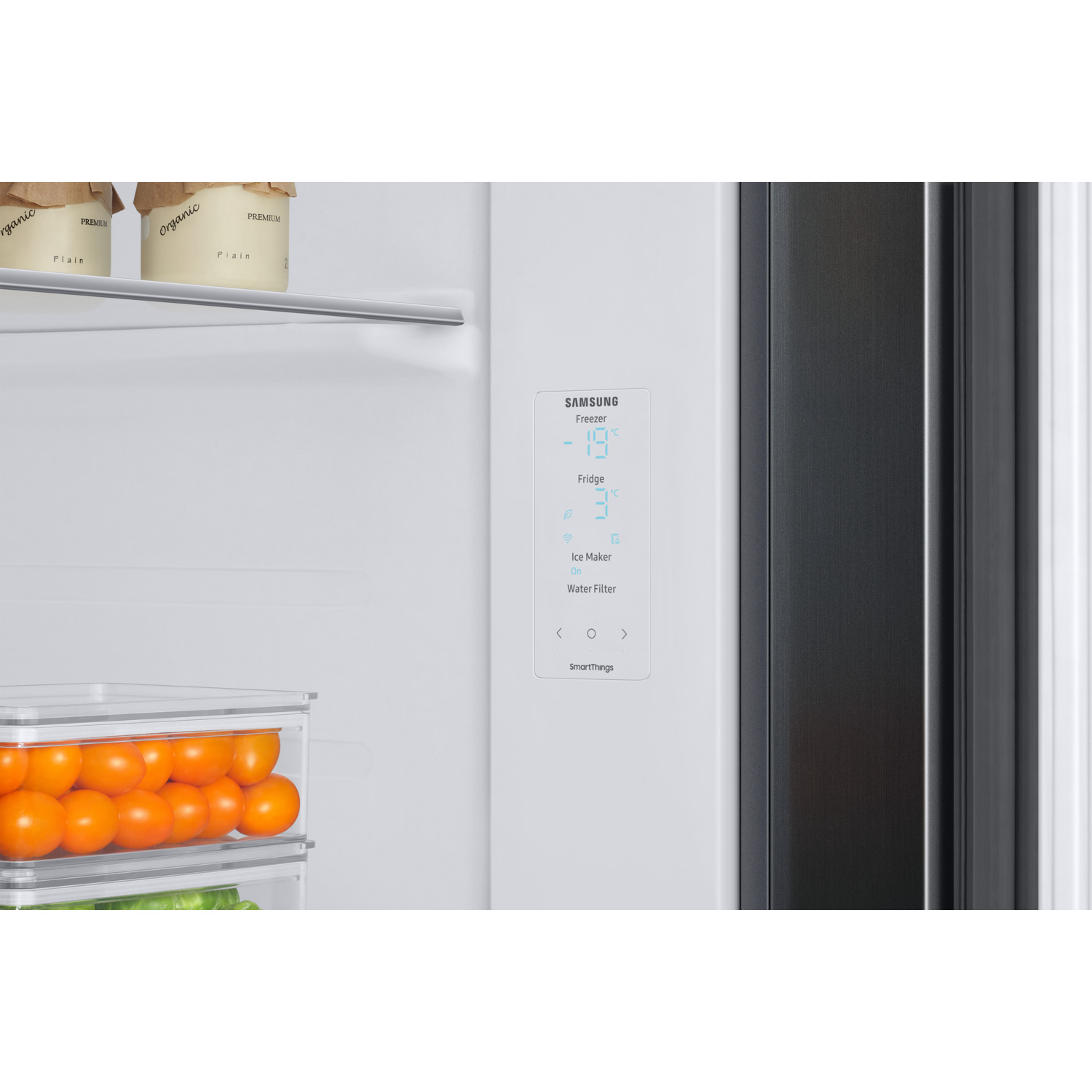 Close-up of a refrigerator with the Samsung logo. The display shows -14 degrees and 3 degrees.