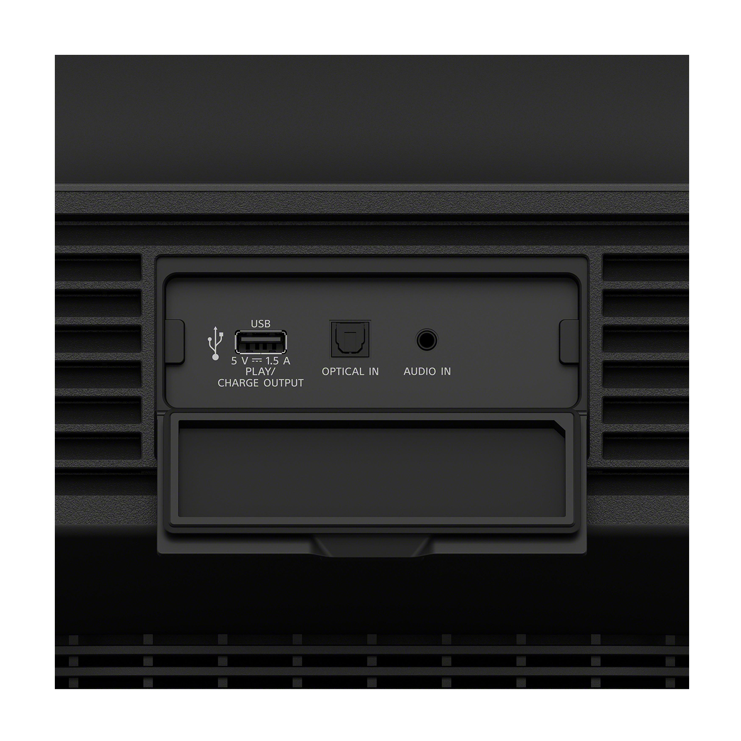 Primo piano di un dispositivo nero con porte, etichettato USB, Optical In e Audio In.