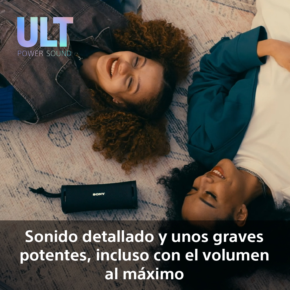 Dos mujeres sonriendo con un altavoz ULT power sound, texto en español.
