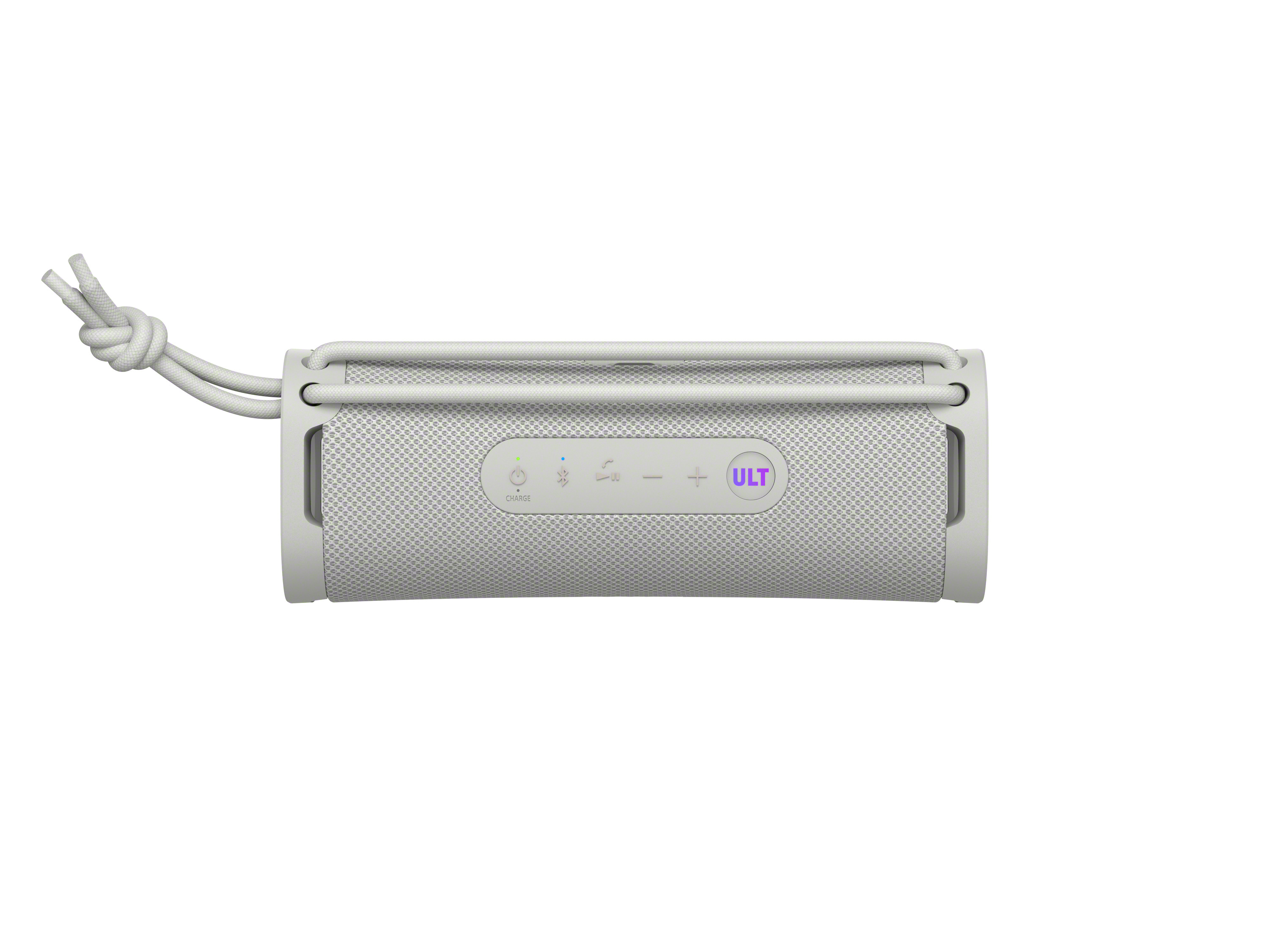 Un altavoz portátil gris claro con botones, un asa y un fondo blanco.