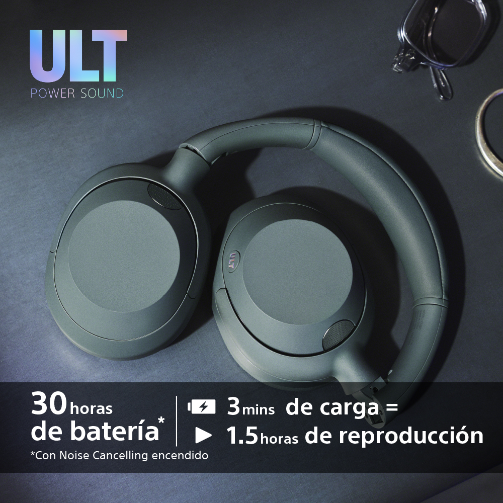 Auriculares grises sobre superficie oscura con texto.