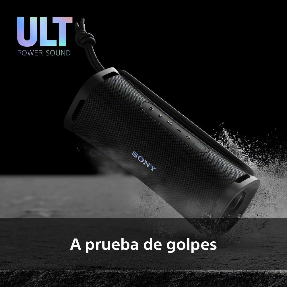 Altavoz negro Sony, agua salpicando. Fondo oscuro. Primer plano. Foto del producto.
