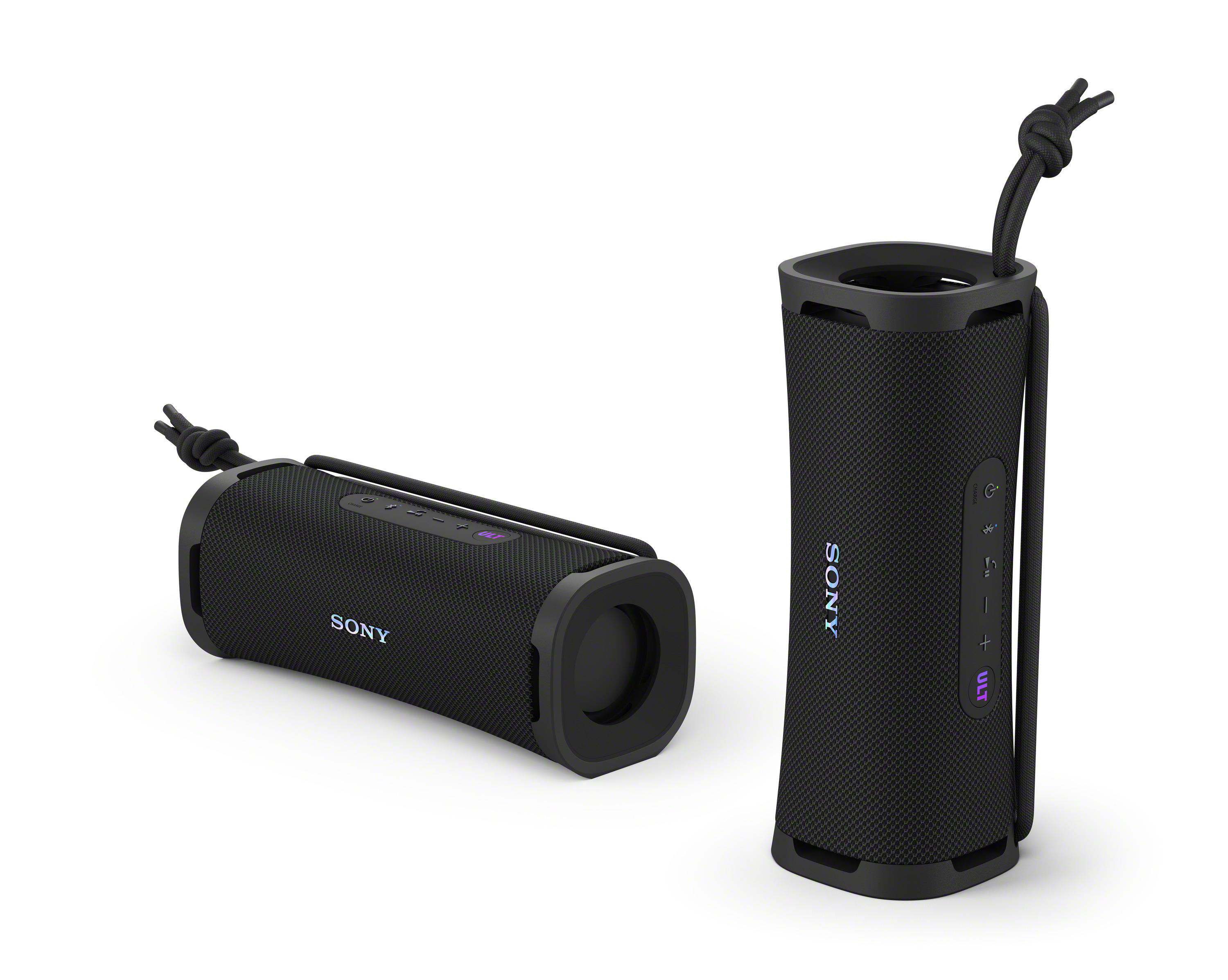 Zwei schwarze tragbare Sony-Lautsprecher, zylindrische Form, weißer Hintergrund.