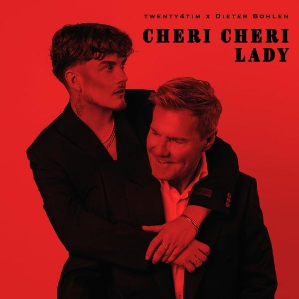 Albumcover mit zwei Männern, die sich umarmen, roter Hintergrund. Titel: Cheri Cheri Lady. Künstler: Twenty4tim, Dieter Bohlen.