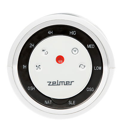Widok z góry na biały panel sterowania wentylatorem z przyciskami do różnych trybów i ustawień timera.