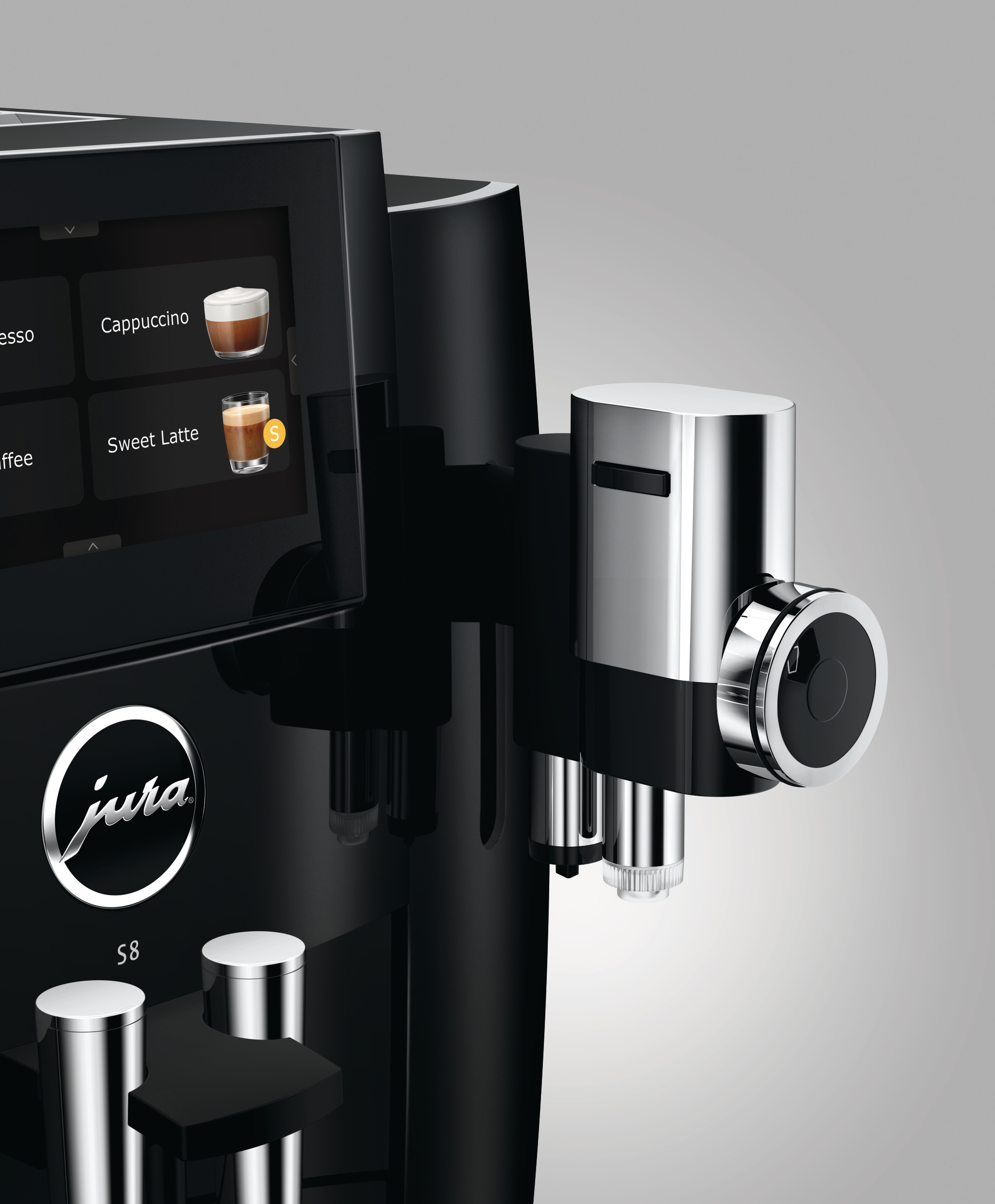 Nahaufnahme einer schwarzen Jura S8 Kaffeemaschine, die den Bildschirm und den Ausguss zeigt.