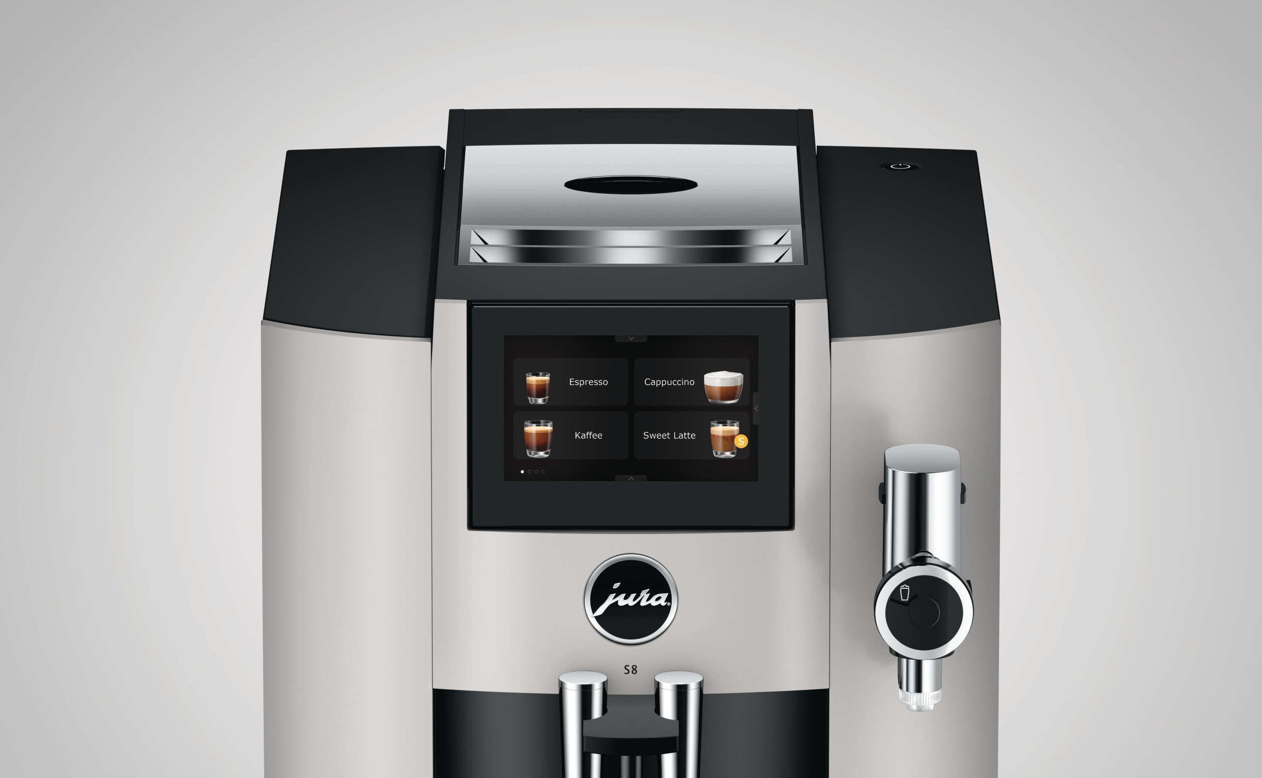 Eine silberne und schwarze Jura S8 Kaffeemaschine mit einem Display, das Kaffeeoptionen zeigt.