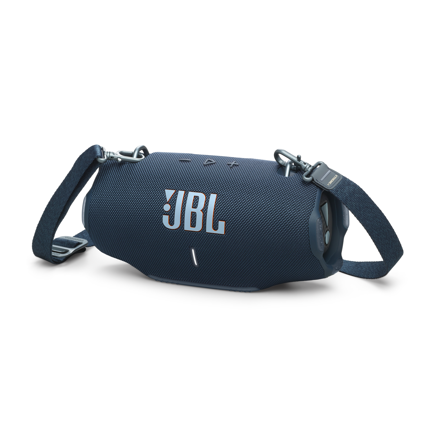 Blue JBL speaker with a shoulder strap. It has a mesh texture and silver JBL logo.