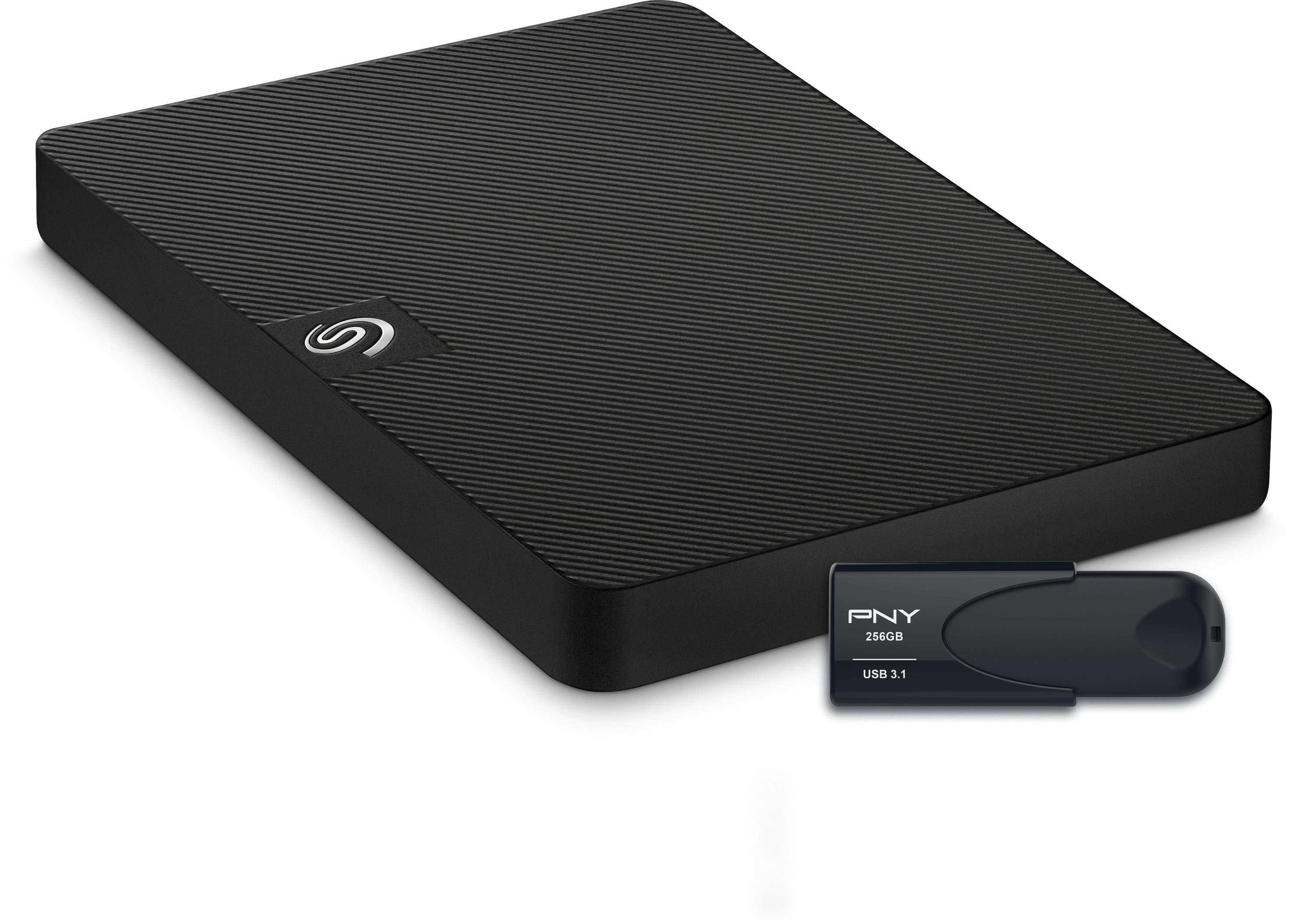 Schwarze externe Festplatte und USB-Laufwerk auf schwarzem Hintergrund.