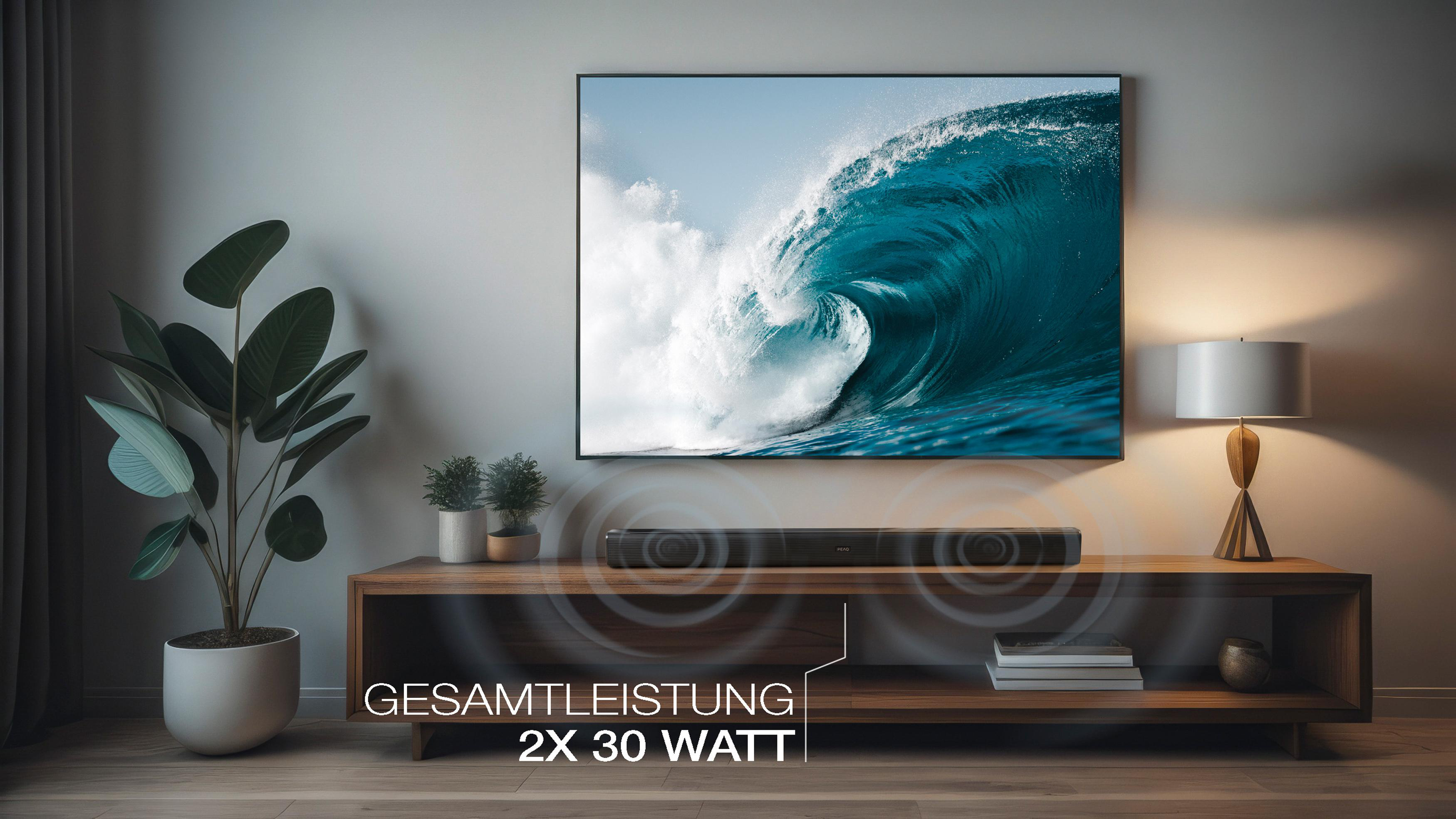 Wohnzimmer mit TV, Soundbar, Pflanzen und Holzmöbeln.